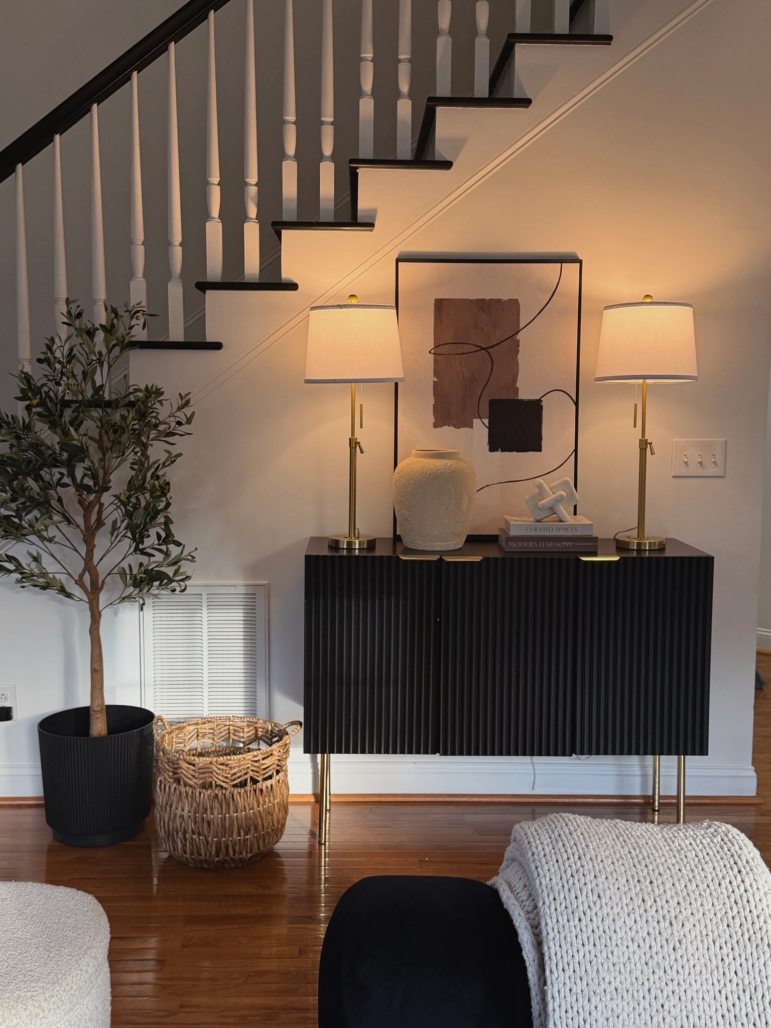 Black console table styling — affordable decor that looks elevated and easy to recreate.

#LTKmomlife #LTKvlog #LTKHome