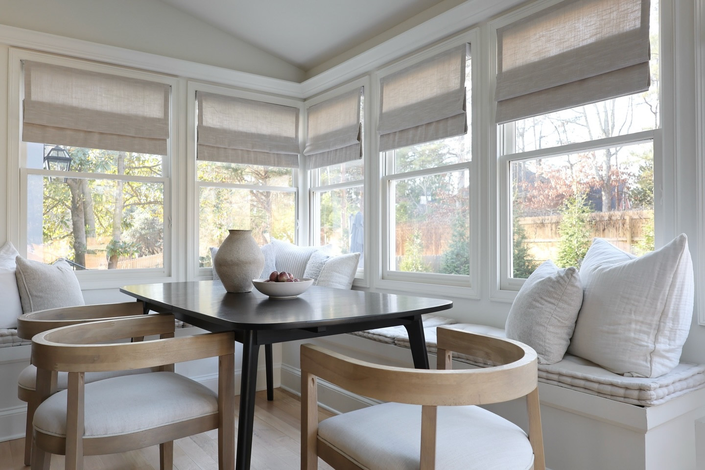 What makes this Kitchen Nook before and after so striking? 

Scale: the table and chairs in the before picture are too small for the space, leaving too much extra room on either side of the bench

Warmth: the stark white paint color in the before picture makes this sunny space feel sterile; choosing a warmer paint color helps make the space feel more cozy 

Visual Weight: the bottom of the before picture feels too heavy with little to balance it out on top; adding Roman shades helps balance the visual weight making the whole space more pleasing to look at 

Get the look: @twopagescurtains Jawara motorized Roman shades | use code SHAYMIRON for a discount 

Follow along for more design tips and send me a DM to work together on your own space! 

#kitchenupgrade #designtips #twopageschallenge #twopagesglowup #cozykitchen

#LTKHome
