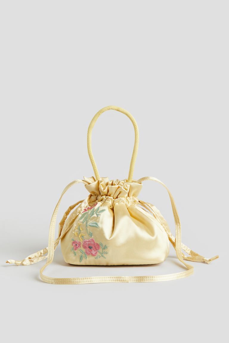 Satin Bucket Bag with Embroidered Motif - Light yellow/flowers - Kids | H&M US | H&M (US + CA)