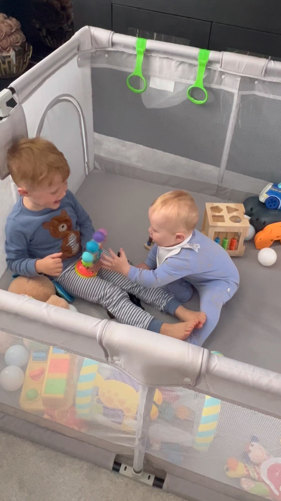 Noah loving Jude’s playpen 😂💙 aka baby jail 🤯😂