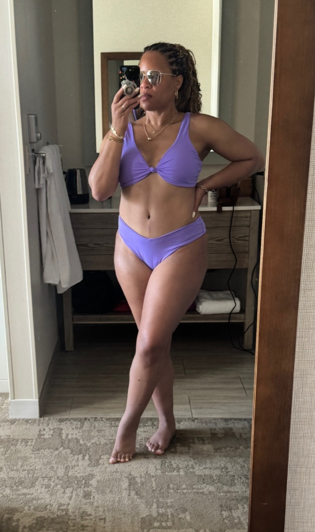 Purple tropical swimsuit.