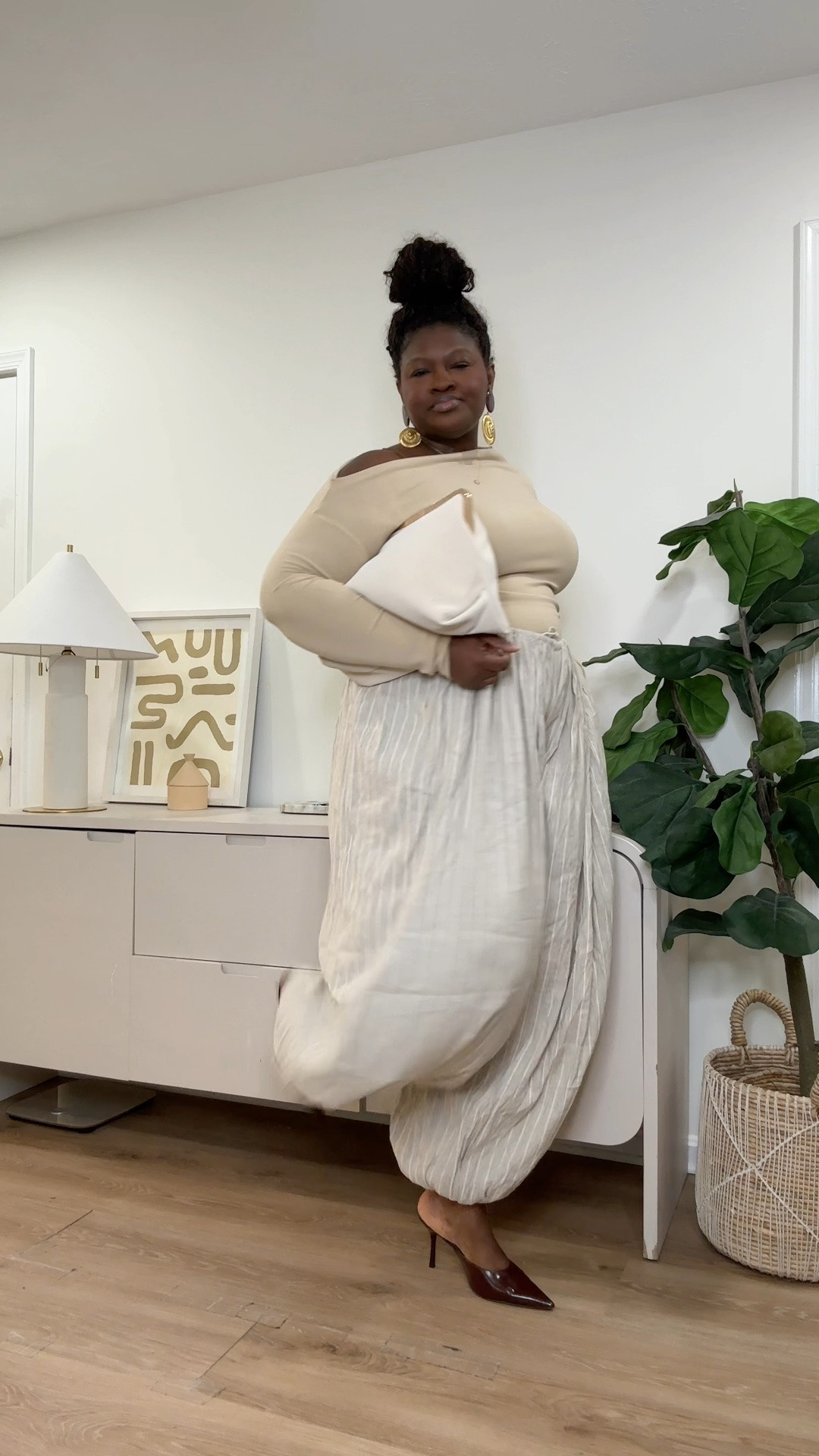 Comfort meets sophistication in this fall outfit. The lightweight pants bring movement while the fitted top balances the silhouette for a look that feels timeless and chic. flowy pants outfit, fall fashion trends, neutral capsule wardrobe, minimal style outfit, curvy outfit ideas, everyday outfit inspiration

#LTKootd #LTKSeasonal #LTKMidsize