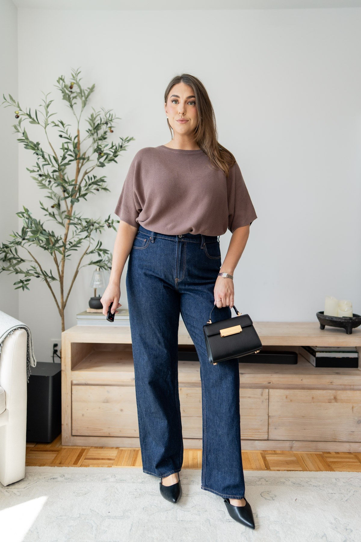 This is such an easy way to make jeans feel a little more dressed up for fall. The chocolate brown top, dark denim and structured black accessories make it feel simple but still really polished. 🤎

chocolate brown top, dark wash jeans, fall denim outfit, elevated casual outfit, classic fall style, polished everyday outfit, midsize fall fashion, size 14 outfit, large outfit, women’s fall fashion

#LTKootd #LTKMidsize #LTKSeasonal