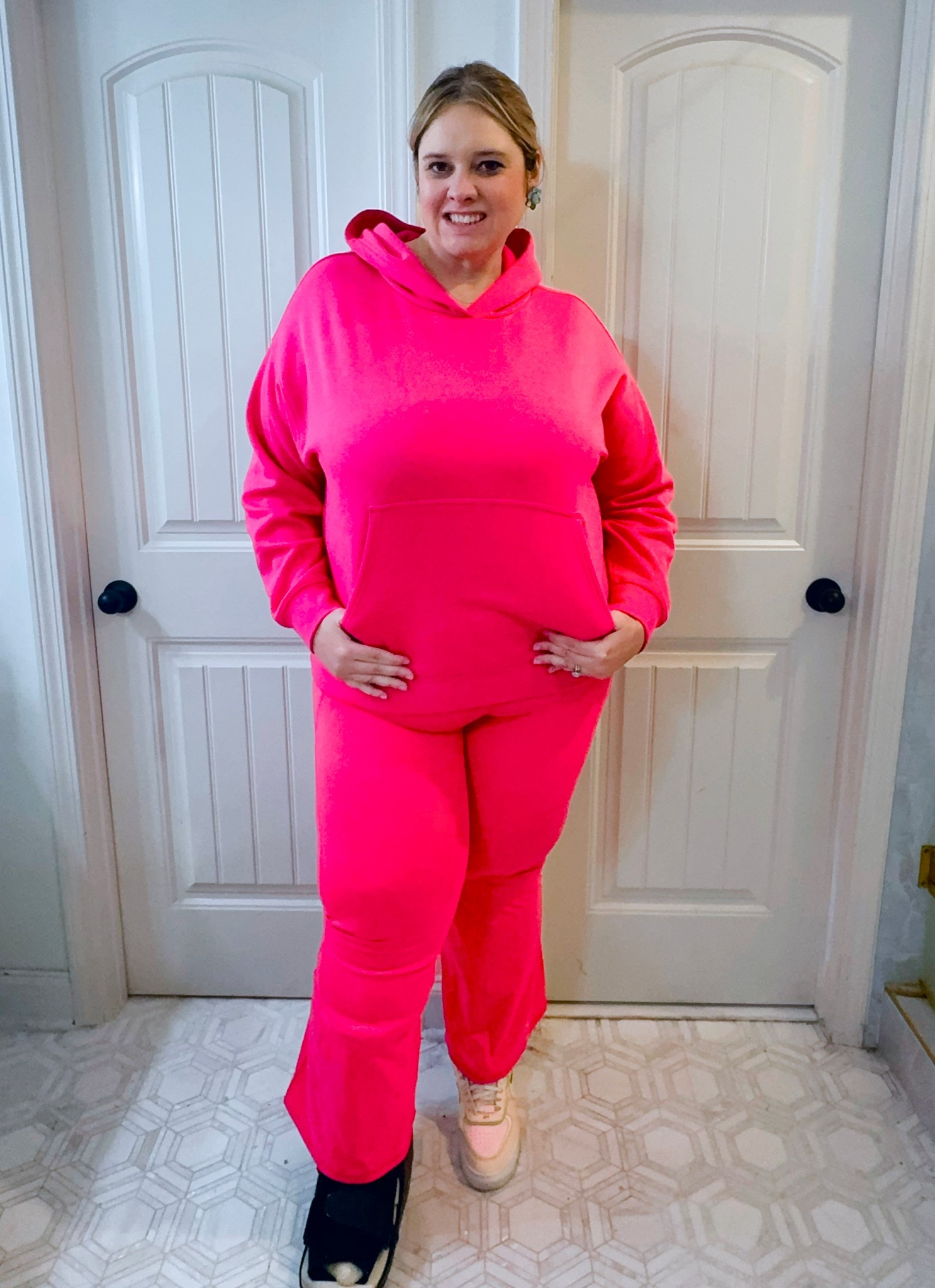 Fractured. Fibula + 31 weeks = officially in my athleisure era 😆 Fabletics is coming in clutch with my favorite pieces in pink crush - I am wearing pure luxe pants and a cozy fleece hoodie. This color is offered in lots of pieces including their wide leg sweatpants - which I have in another color and wear ALL THE TIME. 

#LTKBump #LTKootd #LTKmomlife