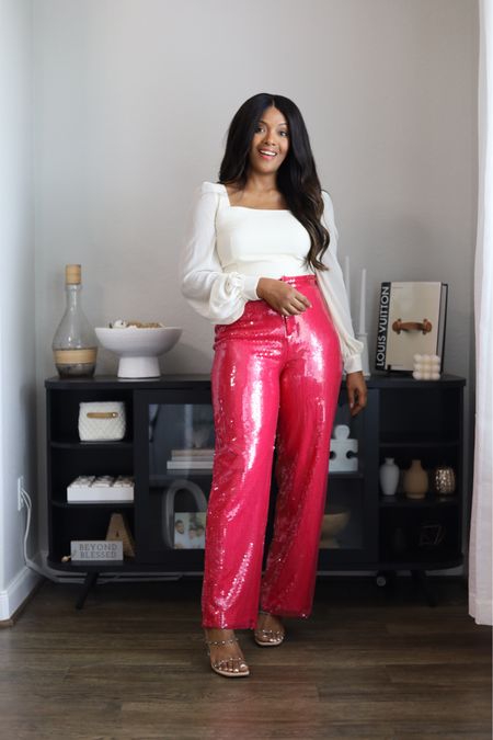 These sequin PINK pants from Revolve are everything! Loving this look for a holiday company party or a fancy dinner. Wide leg pants. Holiday look. Wearing a M for reference. 

#LTKsalealert #LTKCyberWeek #LTKparties