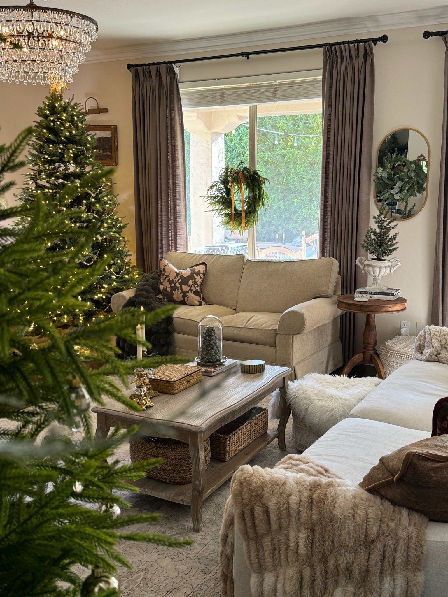 Christmas living room items.

Norfolk pine wreath, mini Christmas tree, Christmas decorating tips and tools, faux fur throw, curtains, crystal chandelier 

#LTKHome #LTKHoliday #LTKSeasonal