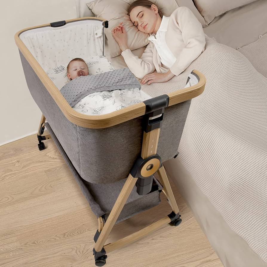 Maydolly Baby Bedside Sleeper, Baby Bassinets Baby Crib with Storage Basket and Wheels, Adjustabl... | Amazon (US)
