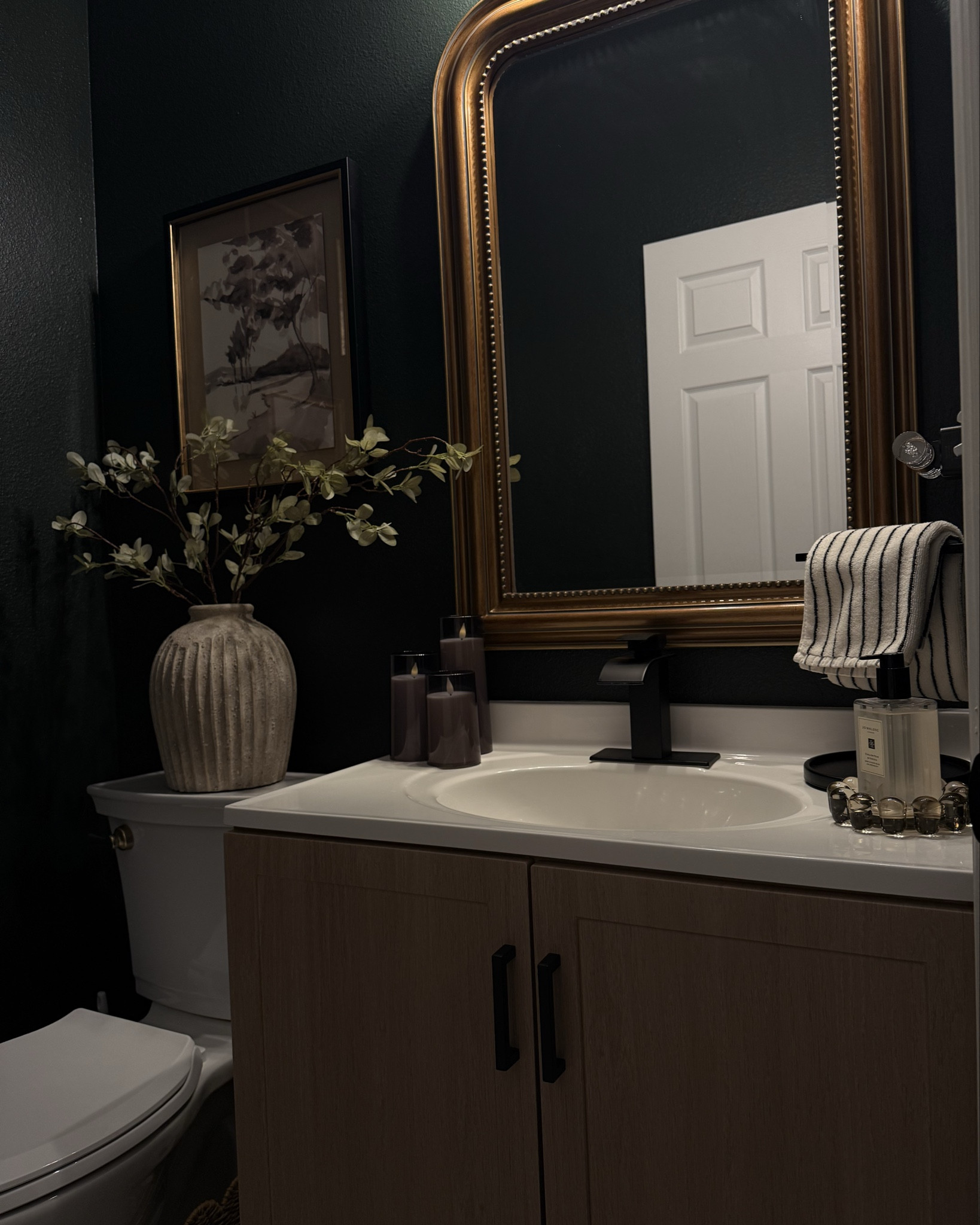 Swipe left- Moody powder bath details.. 
Paint color: SW Jasper 

Powder bathroom, Amazon bathroom find, bathroom vanity, moody bathroom inspo 

#LTKActive