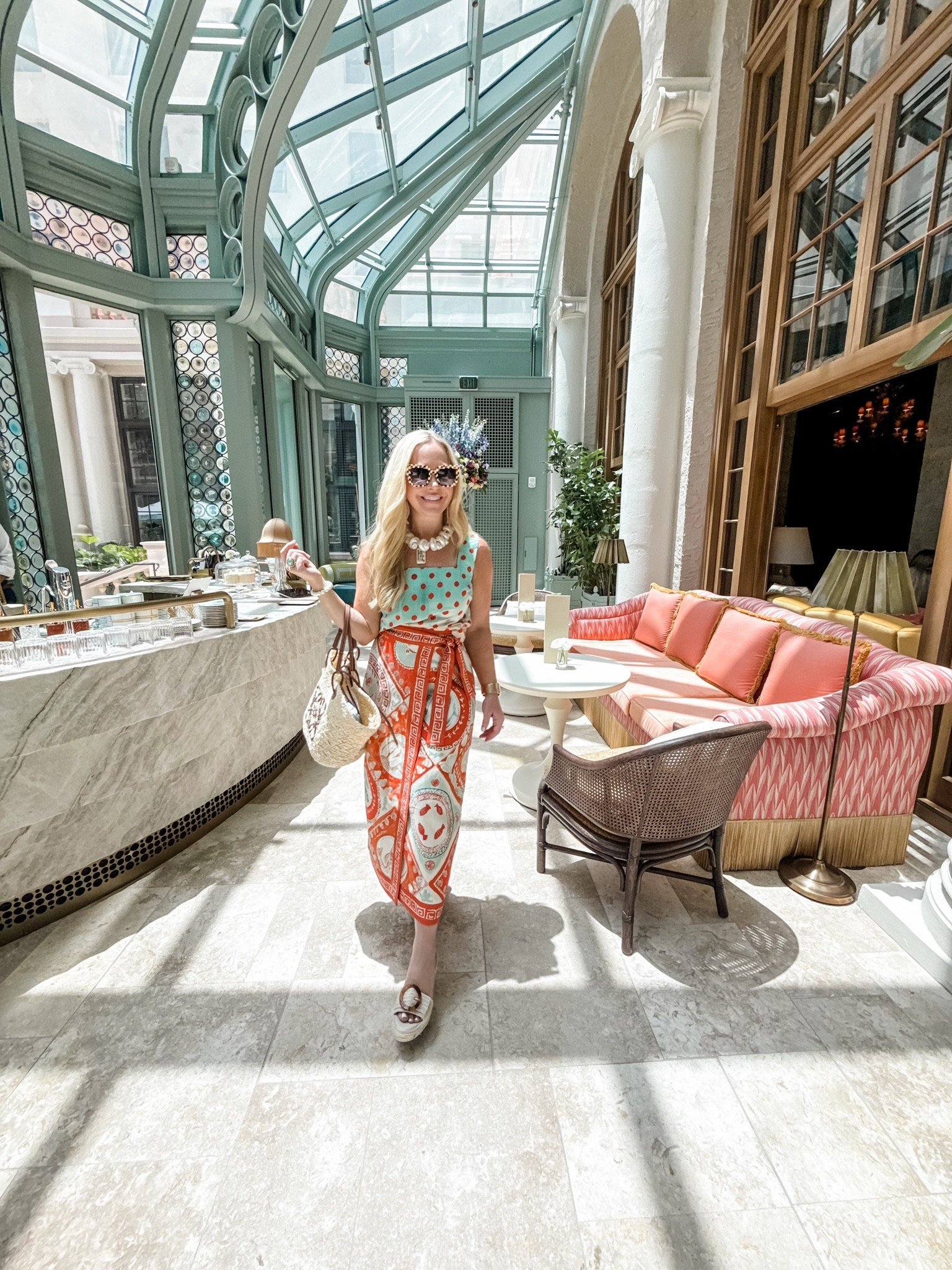 Accidentally matching 🩵🧡 at the new Breakers lobby bar, Palm Beach. 5’4” and wearing a 4 in top and skirt.