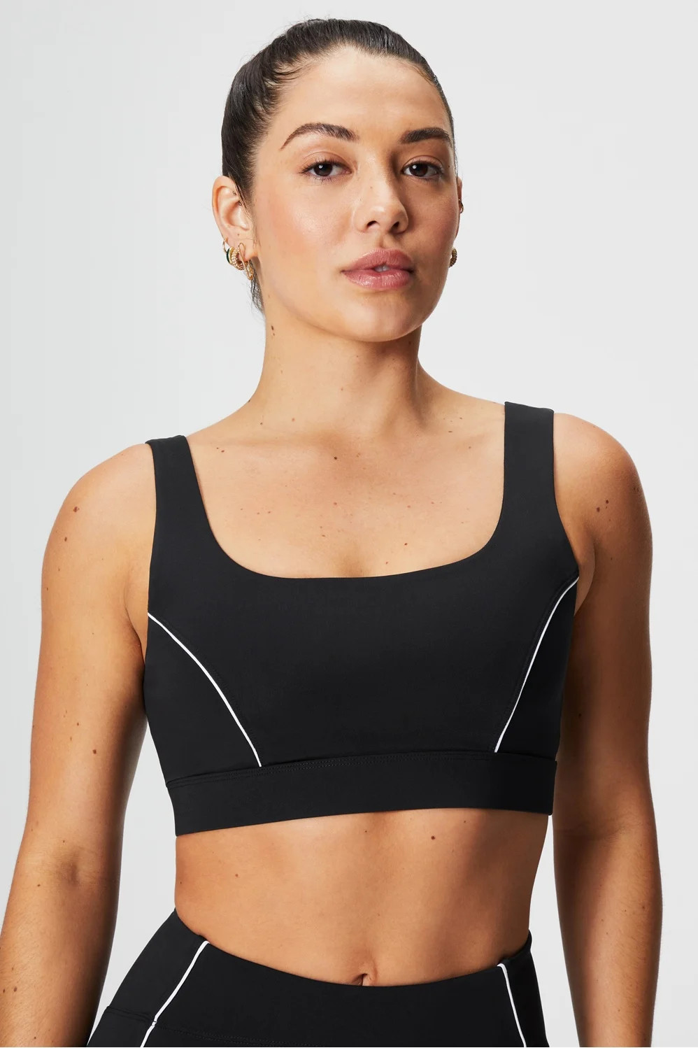 Medium Impact Piped Sports Bra | Fabletics - North America