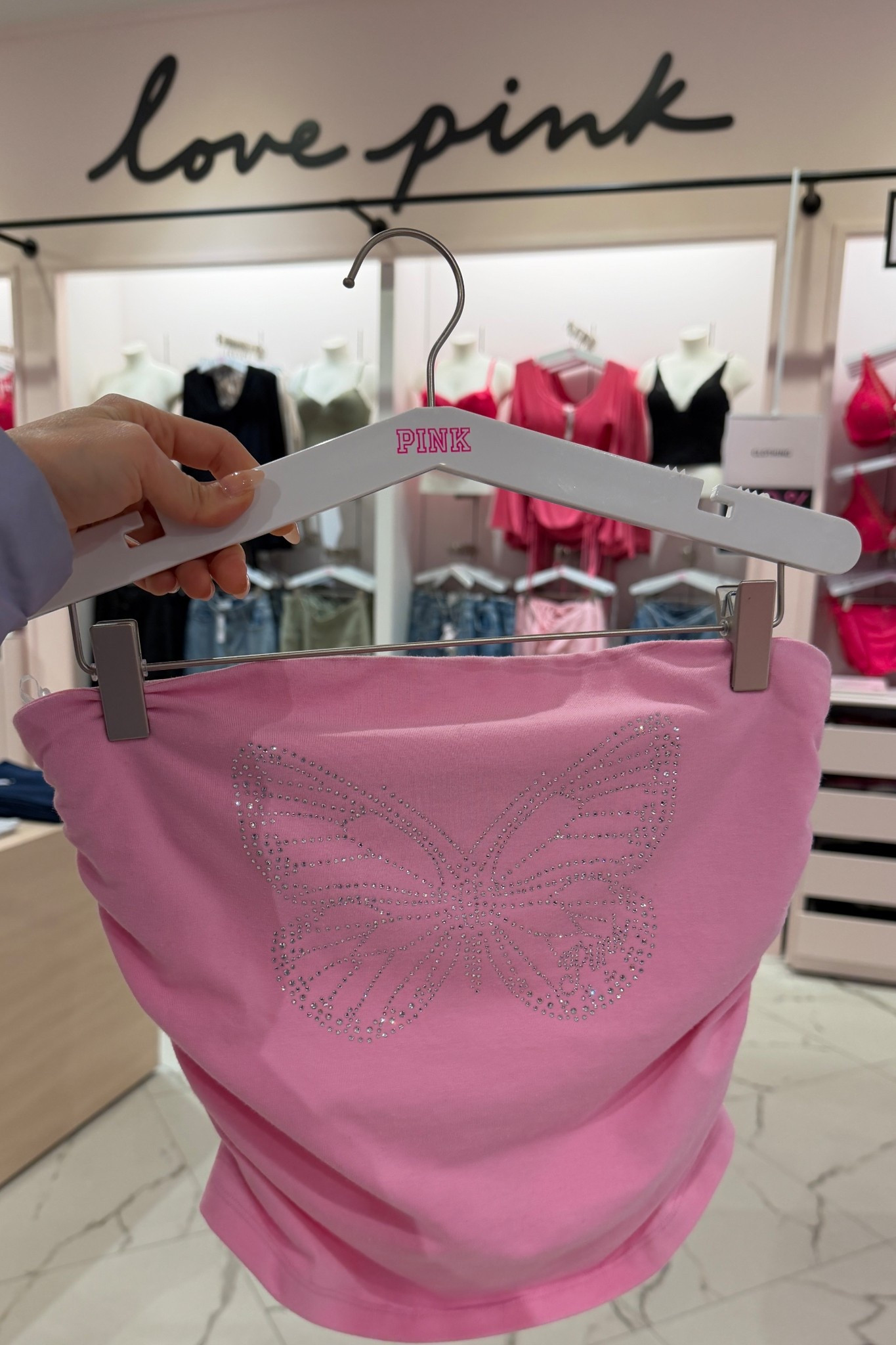 This Y2K sparkle butterfly top is so Hannah Montana! 