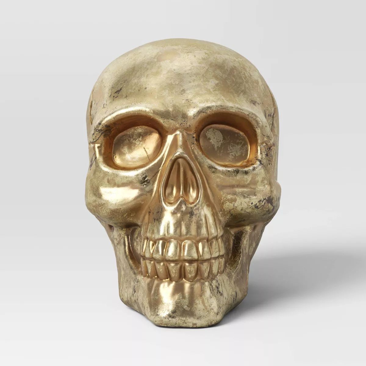 Halloween Plastic Decor Foil Skull Icon - Hyde & EEK! Boutique™: Indoor Gold Skeleton Sculpture... | Target