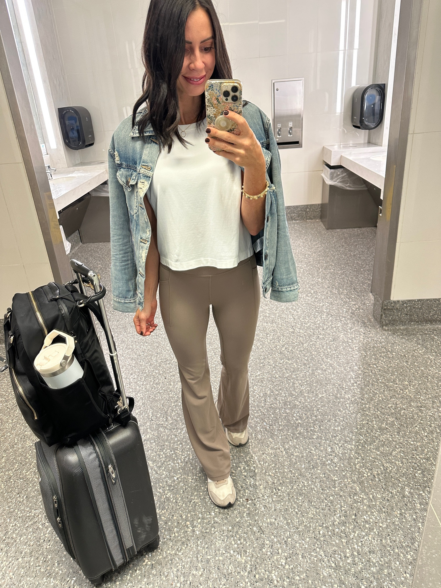 Travel outfit with athleisure/ these flare yoga pants are so soft, form fitting and super cute flare! I’m wearing XS and find them tight but they are long. Consider petite if you’re on the shorter side.

This longer cropped top is lightweight and breathable, doesn’t wrinkle, dries quickly! Wearing small, I recommend sizing down. 

This merly jacket from able is my #1 piece of clothing in my closet. It’s so soft. Wearing a small and it has stretch and room for layering, it’s a nice loose fit.

I use this Lo&Sons backpack daily! It’s on sale- code BACKTOWORK2023 for 30% off!

#LTKworkwear #LTKover40 #LTKtravel