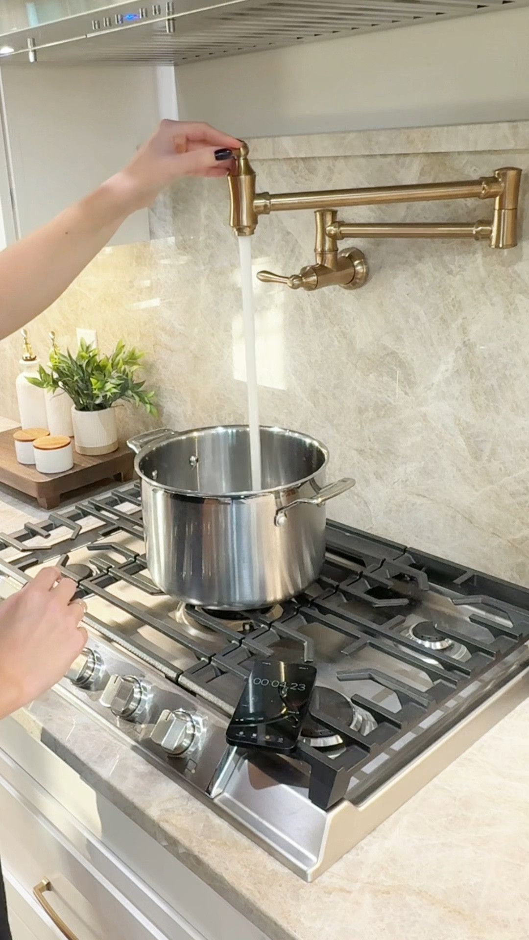 It seems that when it comes to home building you're either a pot filler lover or a pot filler hater.

I'm team love over here - both in terms of design and functionality - and I've got the data to back it up 🤓 

I was able to fill this pot a full minute faster, and I'll be making half as many trips to the sink as I would without it. One minute and one saved trip might not sound like much, but l expect both of those to add up significantly over the many years we plan to spend in this home

#potfiller #kitchendesign #newbuildhomes #champagnebronze
#kitchenmusthaves

#LTKFamily 

#LTKHome
