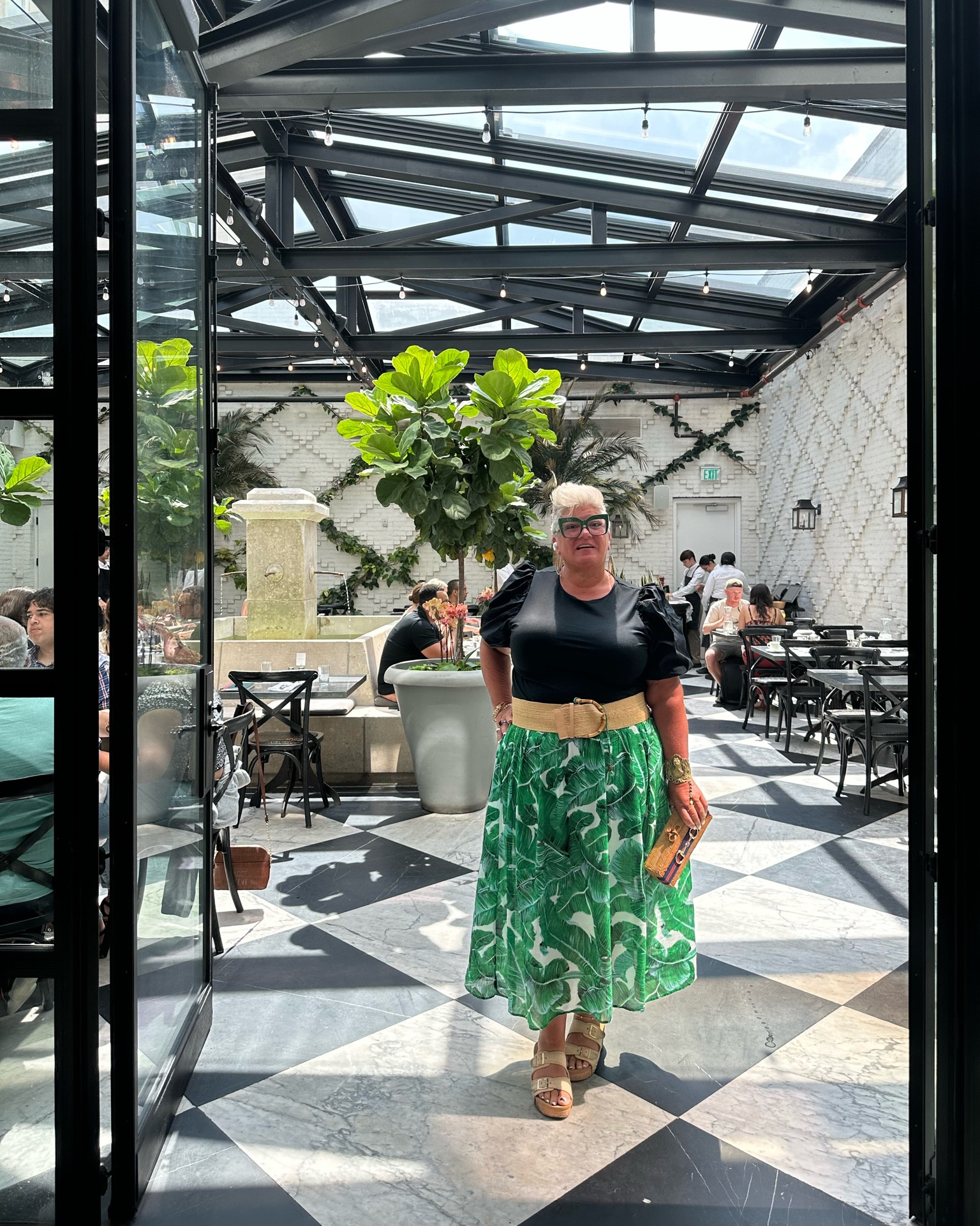 The skirt is from @beulls and the shirt is from @target. Love going to Oxford Exchange in Tampa.