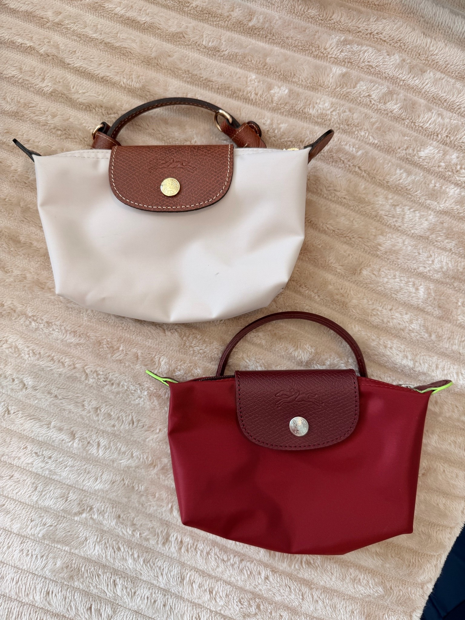 Longchamp, travel tote, le pliage travel tote, mini tote, pool tote, beach tote, vacation tote.
This is by far one of my favorite travel totes. Love how easy is to carry it, also easy to clean, and it comes on a wide variety of colors and sizes.
The mini pouch is perfect for wearing as a mini bag, I added the conversion kit that I use.

#LTKTravel