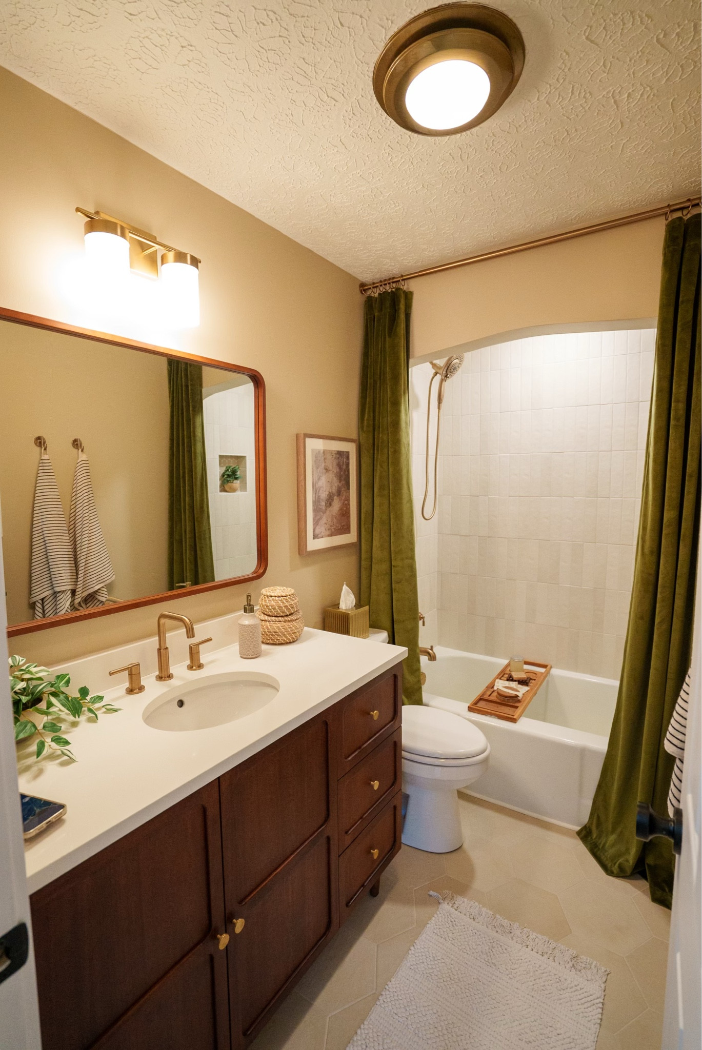 This main bathroom renovation is my favorite so far at the flip house. So many details! #renovation #diy #home 

#LTKhome #LTKfindsunder100 #LTKfindsunder50