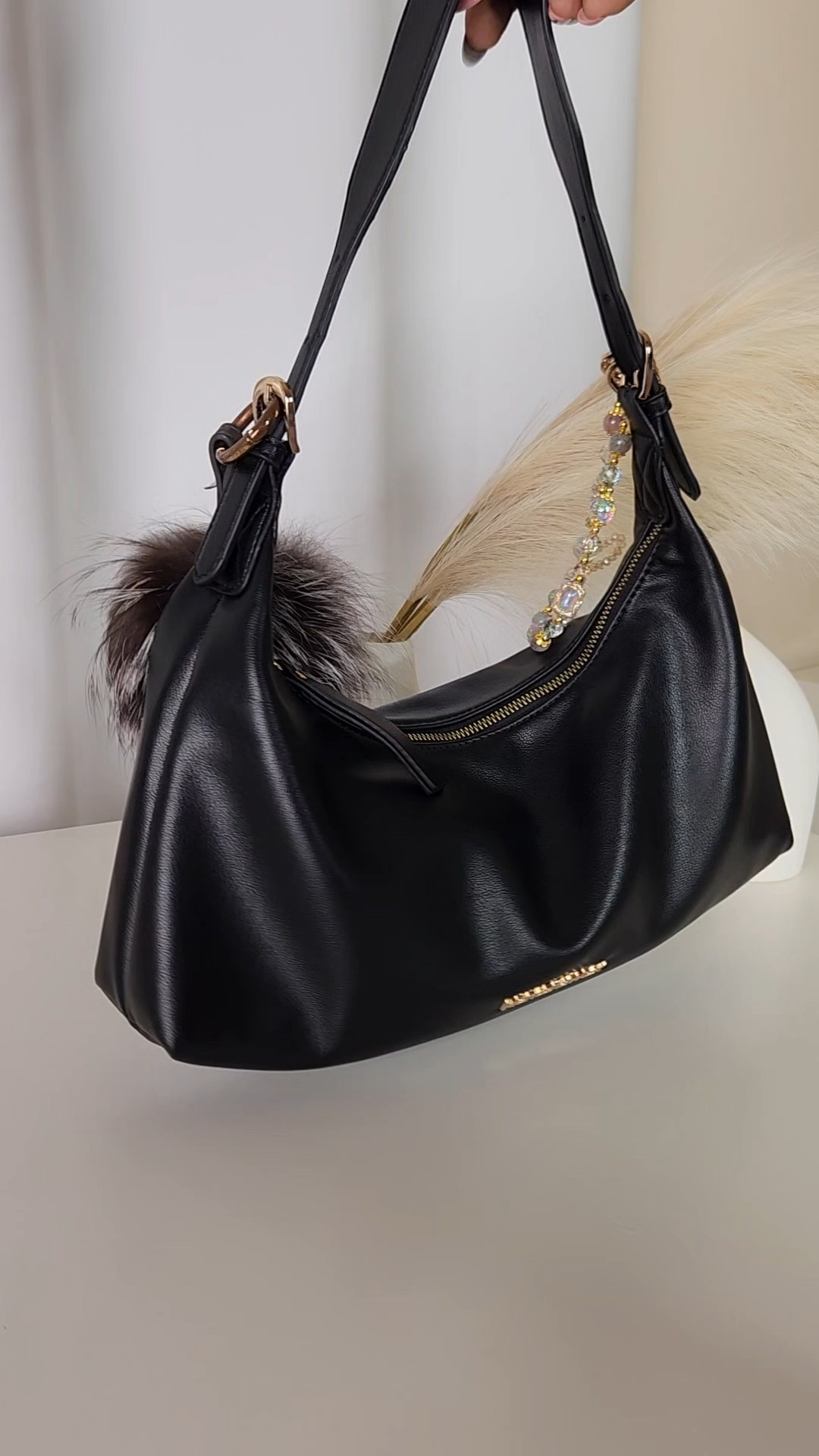 This is the black Montana West Shoulder Bag from Walmart. This trendy Montana West hobo purse is such a great everyday handbag. It has a soft slouchy shape, roomy interior for your daily essentials, and a classic black design that goes with everything. If you're looking for an affordable designer-inspired purse that looks more expensive than it is, this Walmart Bag is a great option for everyday outfits, casual looks, and workwear. Get it while it's in stock.

#LTKmomlife #LTKgrwm #LTKSaleAlert