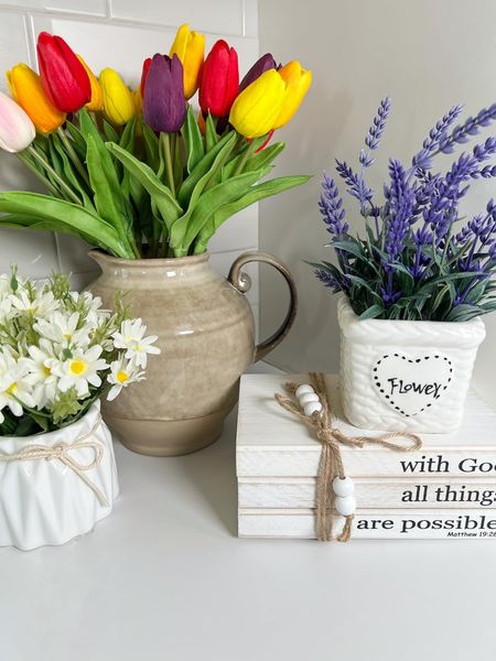 Spring flowers in a pitcher vase and an inspirational book stack! #home #amazon #amazonhome #founditonamazon #spring #springdecor #easter #easterdecor #inspiration #inspirational #flowers 

#LTKhome