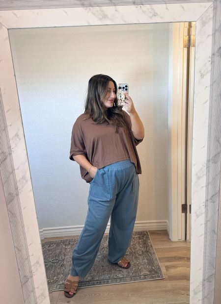 Best basics!! 🤎 Comfy oversize crop tee with wide leg pants, petite and bump friendly!! 

35.5 weeks pregnant and wearing a medium in both 
Sandals fit TTS, also available in wide 

Loungewear, lounge pants, best loungewear, petite fashion, maternity outfit, oversize tee 

#LTKBump #LTKTravel #LTKFindsUnder50