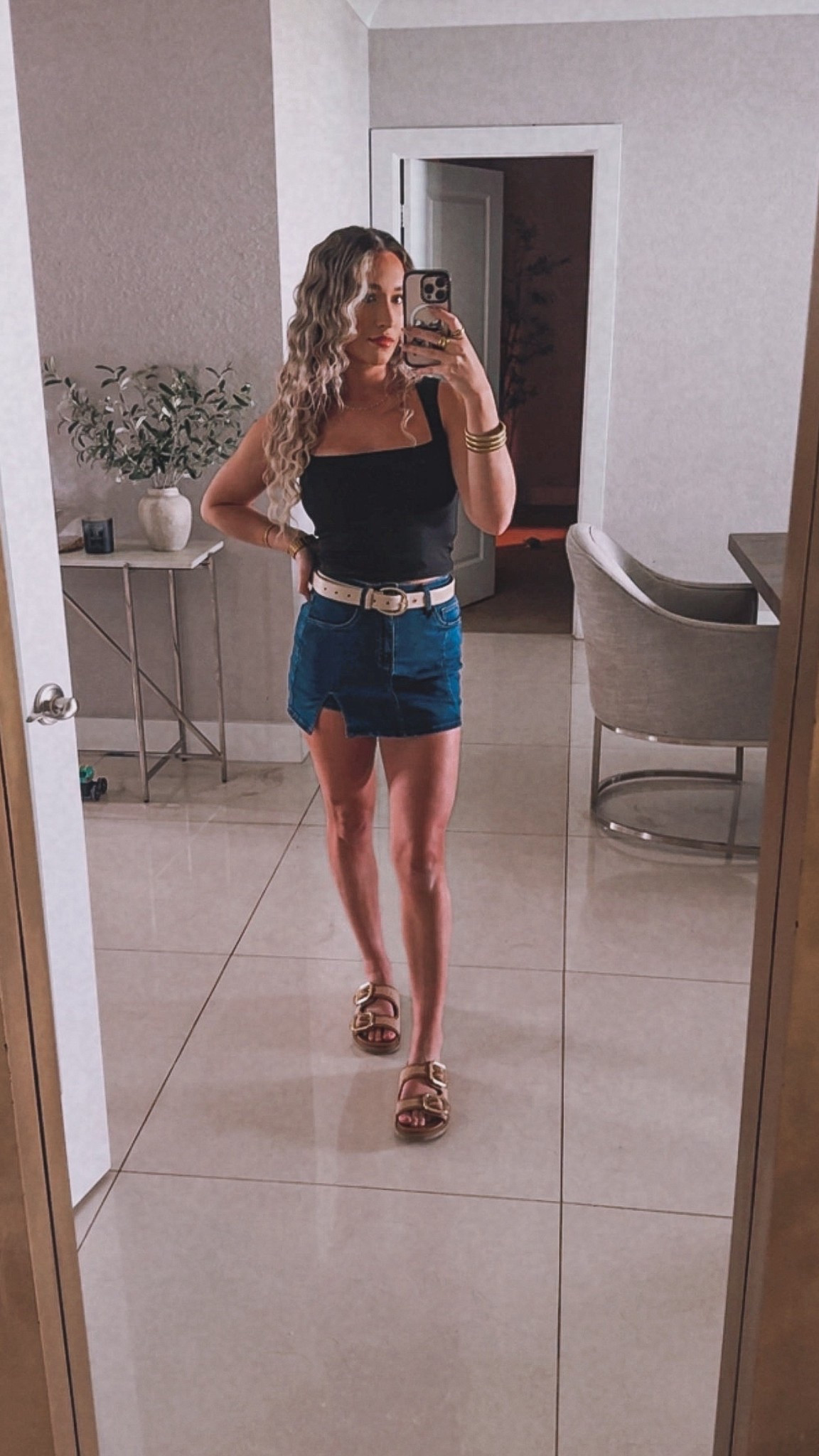 Go-to happy hour/ date night outfit! 
Can dress up with heels or leave casual! 

Hair - fave 1 inch hair tool linked 

Top- size small
(also my fave top with low rise jeans) 

Skirt- size xsmall 
(Has shorts built in but you can't tell!) 

Shoes - almost sold out on target so linked something that's near identical! 

Pair with any belt! 

#LTKFindsUnder50 #LTKU #LTKStyleTip