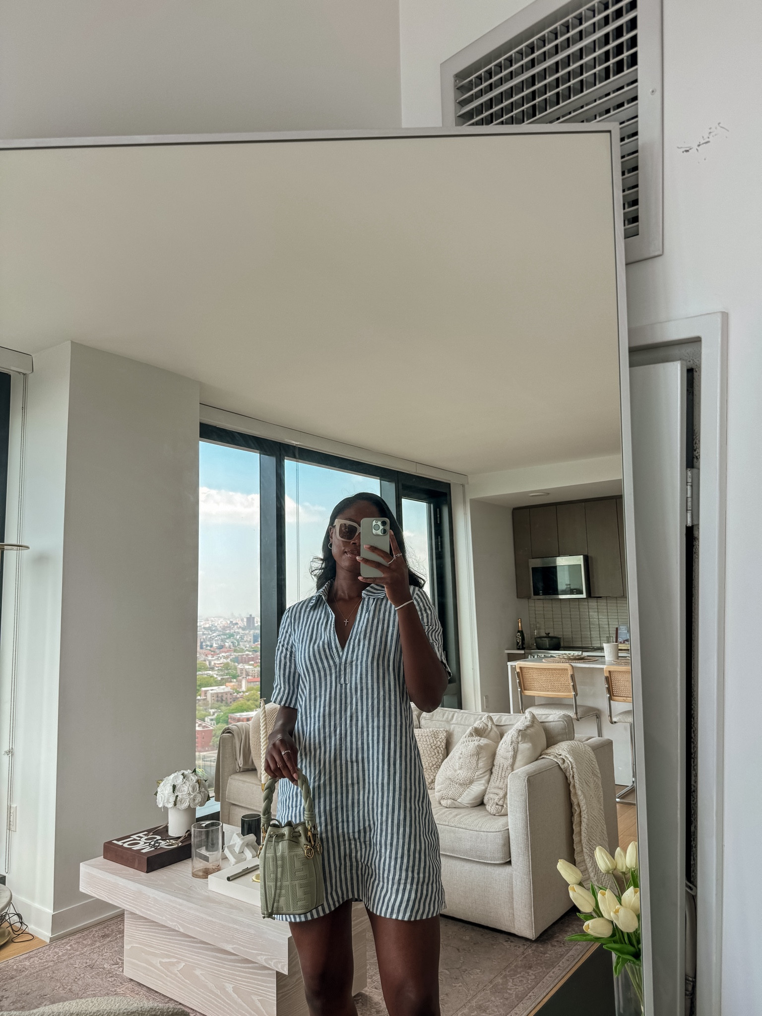 The perfect at home and outside leisurely dress. Wearing a size small. 