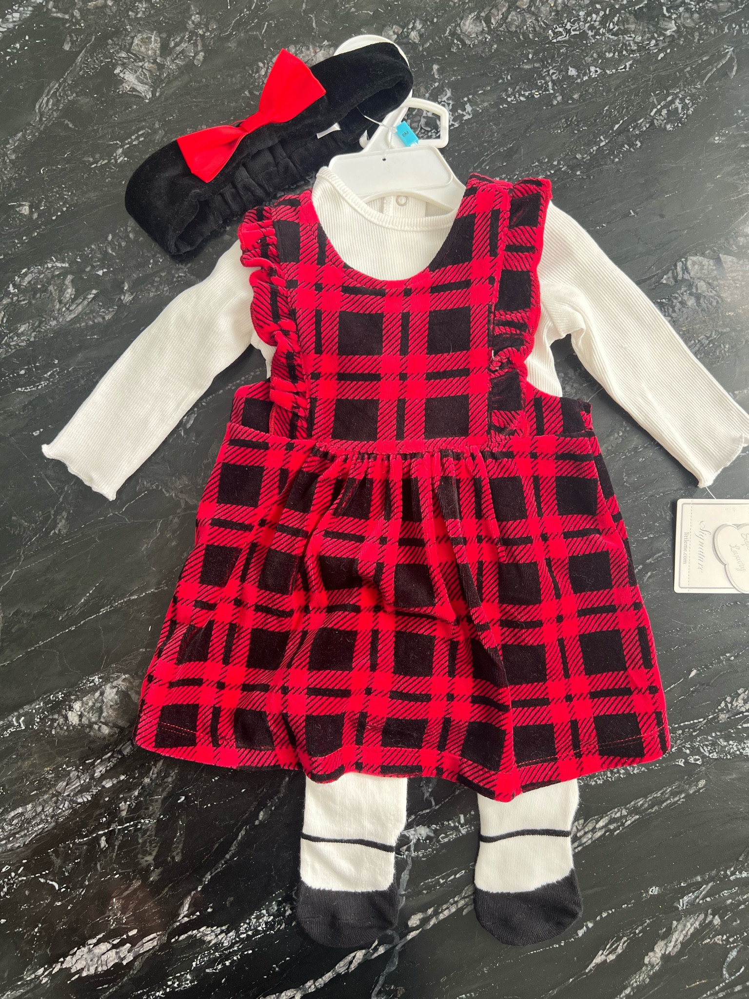 Buffalo plaid baby girl dress! Comes with stockings and headband. Cute holiday outfit for baby! 

#LTKbaby #LTKHoliday #LTKstyletip