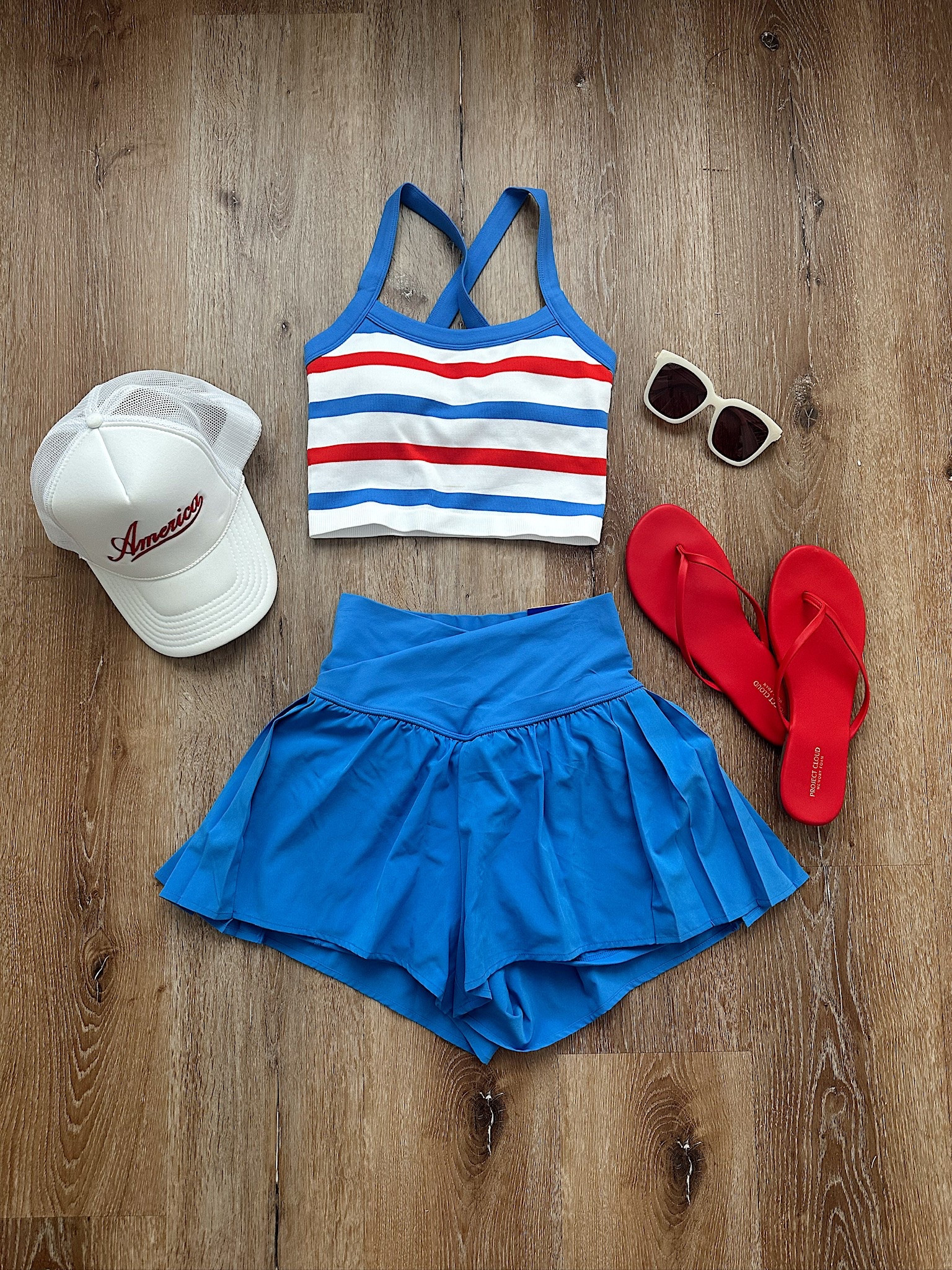 Red, white & blue outfit inspo! Small top and shorts, sandals, hat, sunglasses.

#LTKgrwm #LTKootd #LTKSeasonal