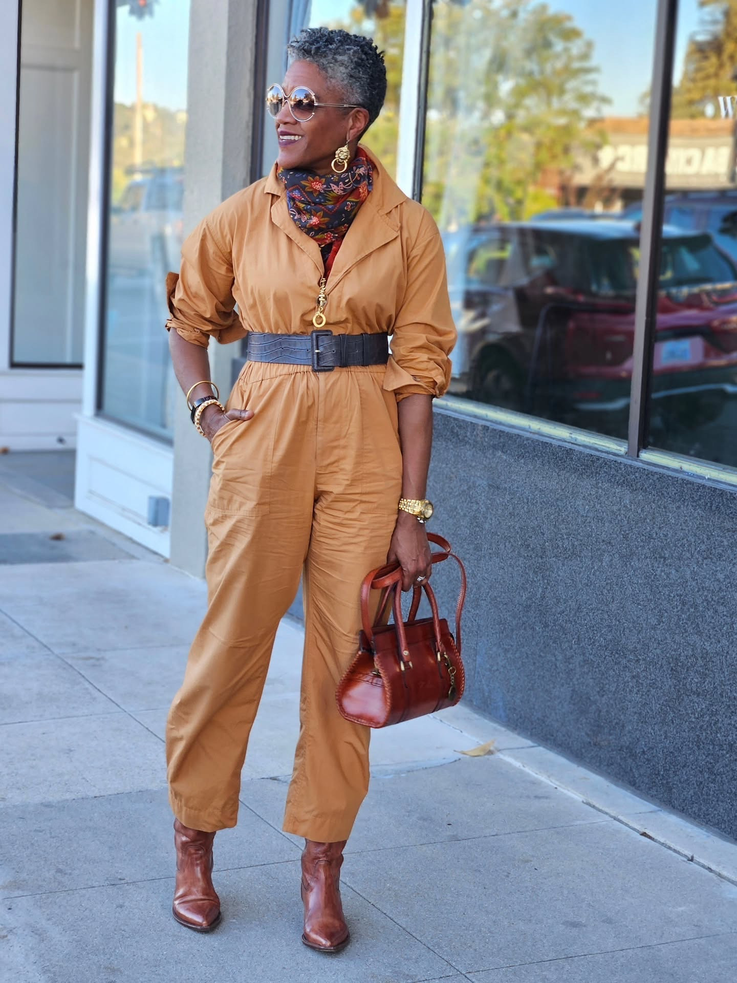 Last minute fits are sometimes the best. When I ran out of time the other morning I grabbed this recently thrifted A.L.C. jumpsuit. One and done, but I had some things to give it life.

I added earrings my Mom thrifted, thrifted scarf, belt, and an old pair of cowboy booties.

I'm also gonna give a little respect to my makeup. It's looking pretty good at the end of the day.  You may or may not be aware that I'm learning the skill of applying makeup. I know I'm gonna need this skill in the near future. I need to be ready.

Jumpsuit (thrifted): A.L.C. @alc_ltd 
Boots (hella old): Cole Haan @colehaan 
Bag: Nila @nila_bags 
Earrings: Mom thrifted and gifted to me 🥹 
Scarf: Thrifted 🤷🏾‍♀️
Sunnis: Chloe 

How do your last minutes fits work out?