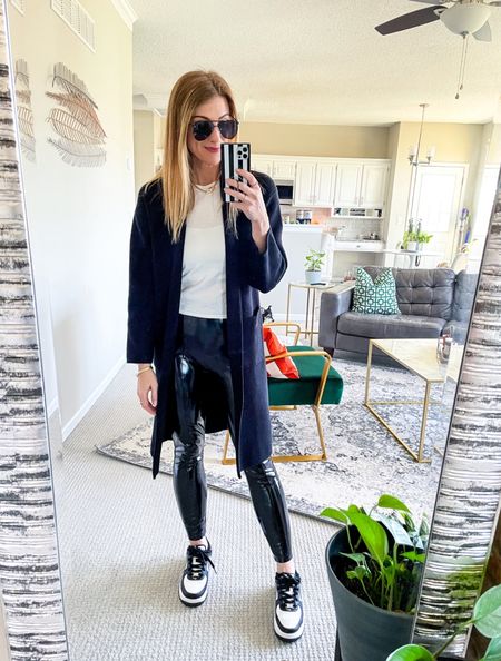 Black and white with a pop of vinyl. 

Wearing a small in the cardigan (the Mango coatigan dupe!) and the leggings, medium in the tshirt, and size 7.5 in the sneakers. 

#LTKstyletip #LTKCyberWeek #LTKsalealert