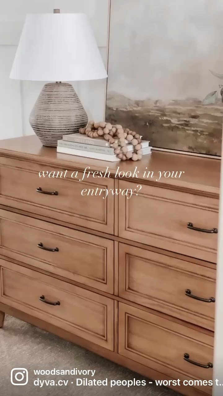 Want a fresh (and functional) new look in your entryway? Add a dresser! I found this one at Home Depot and it is gorgeous! I ordered it online for curbside pick up, assembly was easy and only took about an hour and a half start to finish! I love how it hides my lamp cord and how much storage it added in here! Perfect place for seasonal items like hats and mittens, dog leashes, keys, tote bags, sunscreen, beach bags, etc. 
.
@homedepot #sponsored #thehomedepot #entryway #entrywaydecor #entrywaytable #entrywaydesign #dresser

#LTKhome