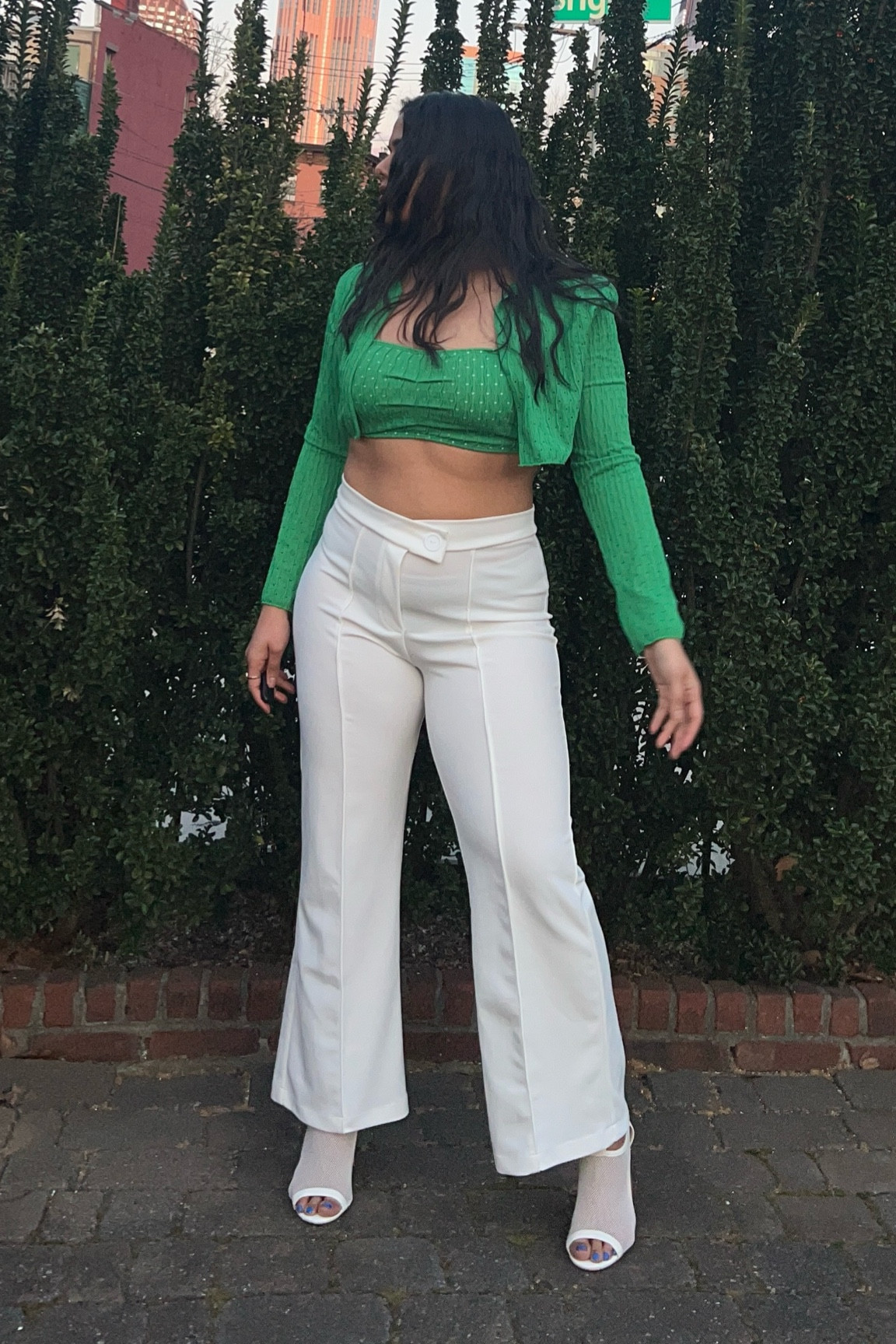 St. Patrick’s Day Outfit

Dare to stand out in a crowd with this stunning emerald top! 🌟 Twirling into the golden hour, this look is all about making a statement. Add these must-haves to your cart! ✨

Embrace the power of a bold color contrast—this cropped long-sleeve top is the vibrant touch your wardrobe's been craving, paired perfectly with classic ivory flared pants. The top's ribbed detail and flirtatious cut complement the high-waisted, tailored elegance of the pants. Step into the scene with these chic white mules, an ode to sleek simplicity. Accessorize with your confidence, and you're ready to conquer the city streets. You're going to adore how these pants from Fashion Nova streamline your silhouette for every occasion—your new go-to for chic comfort!

Here’s a secret, the top half of my fit is actually a swimwear outfit. I got the set from SHEIN a couple years ago. So this OOTD might be perfect for a beach vacation or a girl’s trip. 

#LTKstyletip #LTKFestival #LTKmidsize