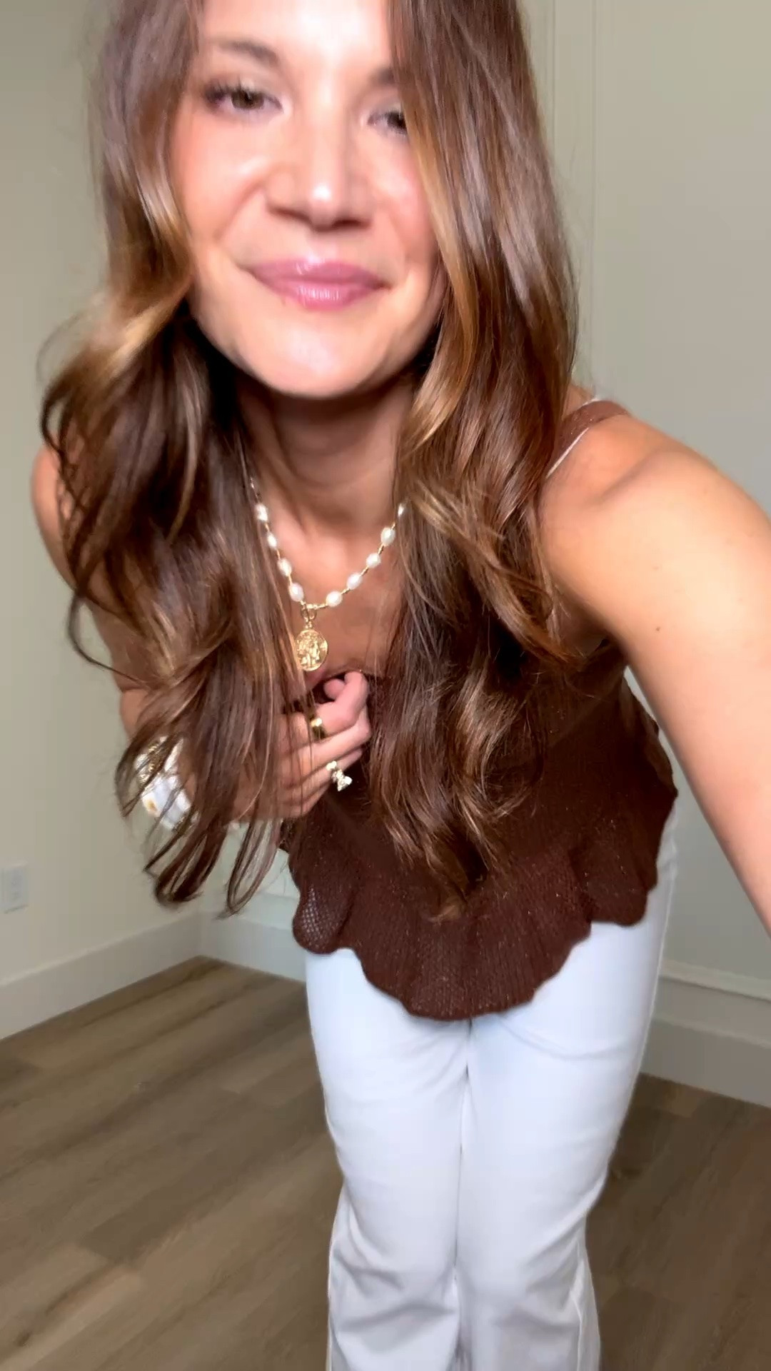 This top is such a good elevated basic for summer. I love the textured detail and peplum fit paired with white denim for an easy outfit that feels a little dressier without trying too hard. Perfect for dinner, vacation, or everyday wear.

Brown peplum top, elevated basic outfit, white jeans outfit, summer dinner outfit, casual chic style, textured tank top, neutral summer outfit, vacation dinner look, effortless everyday style, dressy casual outfit, summer date night outfit, flattering peplum top, classy summer fashion, spring and summer style, Stang and Co

#LTKootd #LTKSeasonal #LTKTall