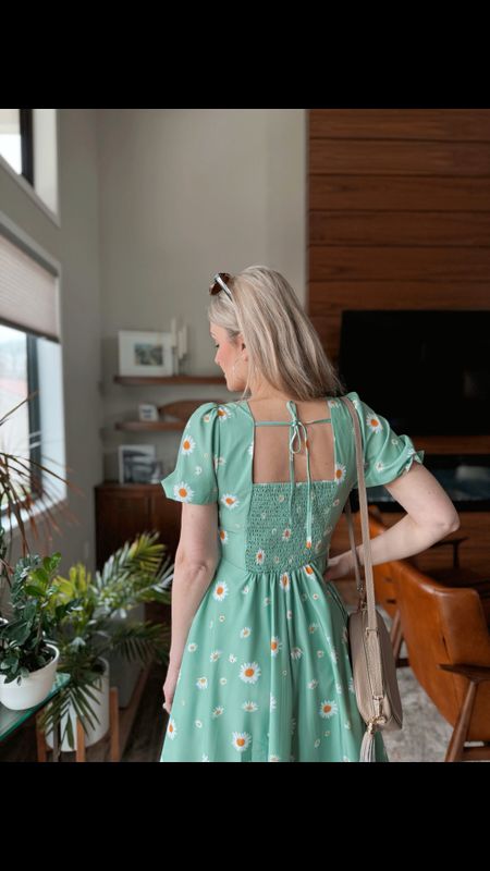 Ready to bloom in this fresh, flowy floral dress! Perfect for those sunny spring days when you want to feel as light and carefree as a breeze through a garden. I am wearing green daisy print. 🌼 #SpringVibes #FloralFashion 

#LTKparties #LTKtravel #LTKwedding