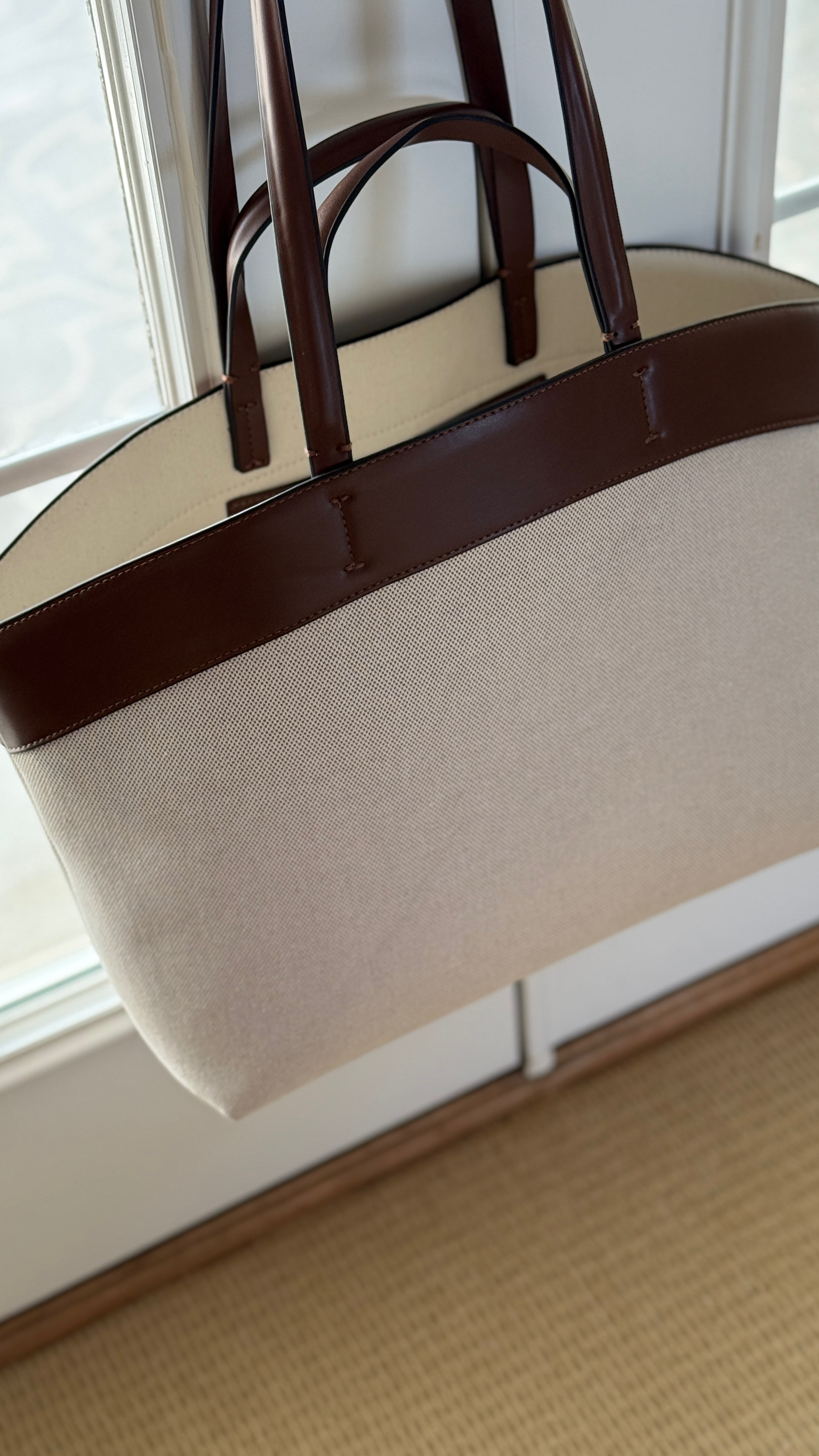 Perfect budget work tote for spring. On sale for $38!!

#LTKWatchNow #LTKItBag #LTKFindsUnder50