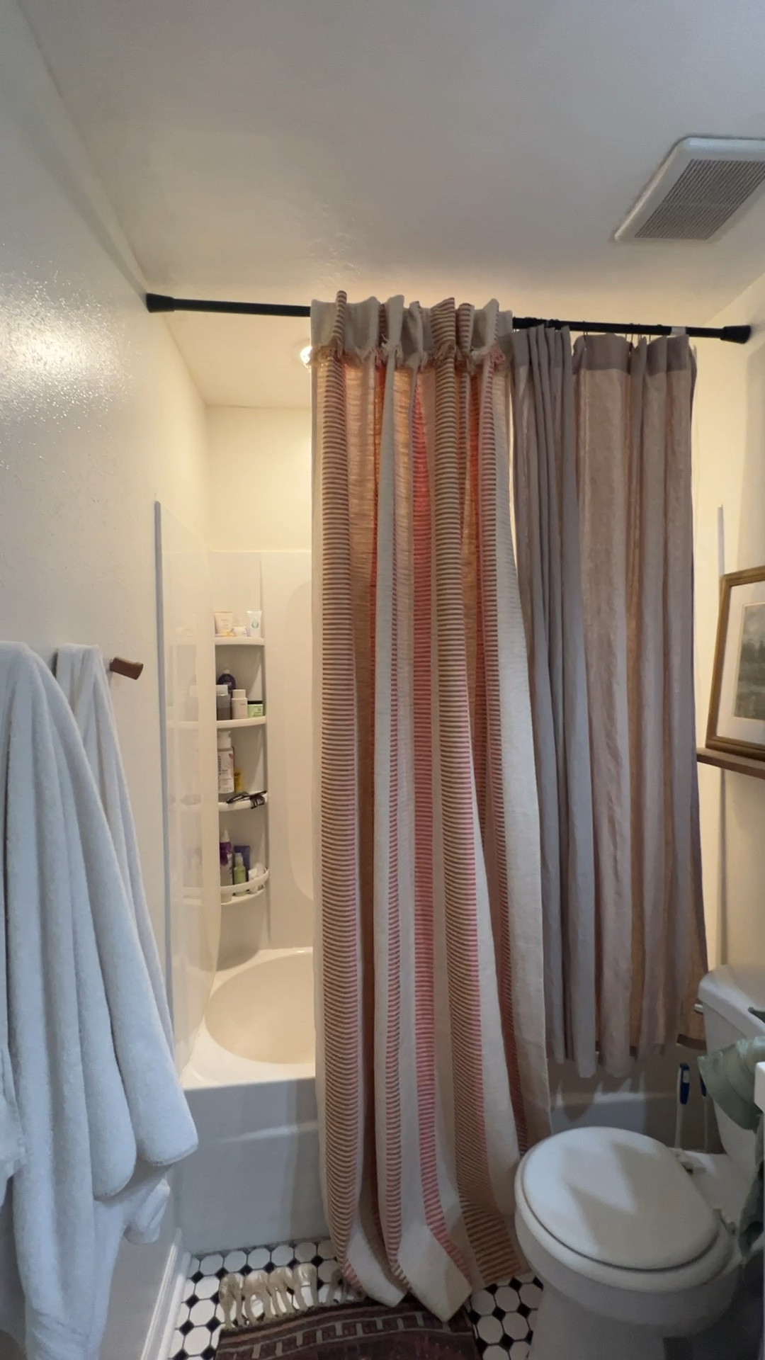 Small bathroom hack: move your shower rod to the ceiling and use a full length curtain to make the space feel 10x larger 🤯

#LTKhome #LTKVideo #LTKSeasonal