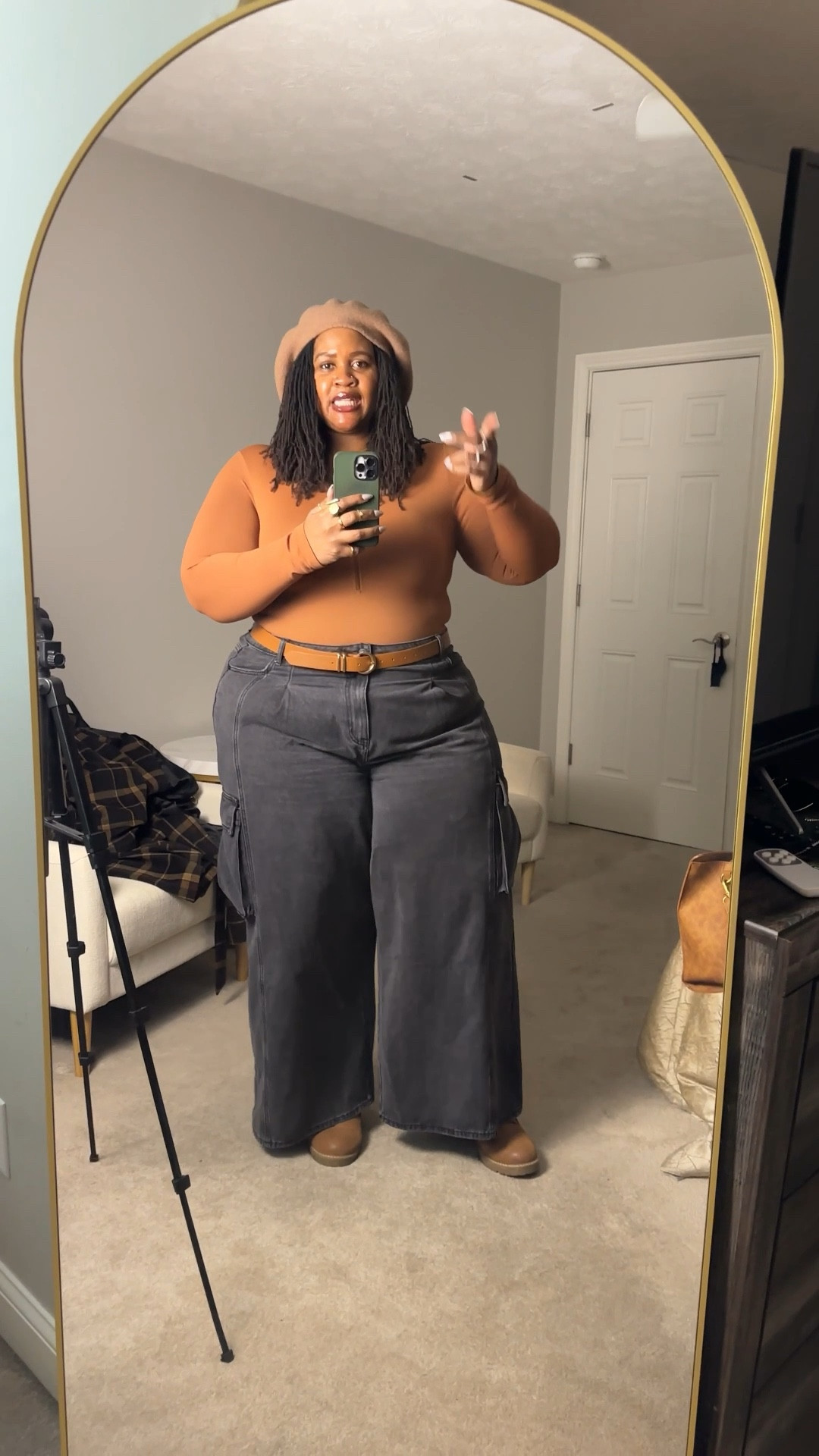 A cute lil casual outfit for my plus size girlies 😍 I’m wearing the bodysuit in a size 3X/4X. It’s so comfortable and closed and I just love this shade of brown. The belt is part of a set of 3 and I wear every single one 😂 I got these in a size 42-47in waist. That’s how their sizing works. And the jeans are in a 22! ELOQUII just restocked so all sizes are available. 

The boots are oldies from Torrid and no longer available so I linked to some other cute ones. The exact beret is sold out in this color, but is available in black and white. I linked to another one from free people that would look cute with this. Enjoy! 

#LTKootd #LTKFindsUnder50 #LTKPlusSize