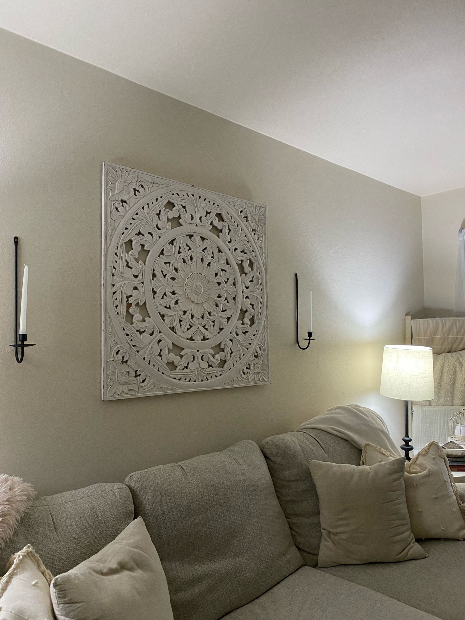 Living room wall decor change up! Love these candle sconces  

#LTKfindsunder50 #LTKhome #LTKstyletip