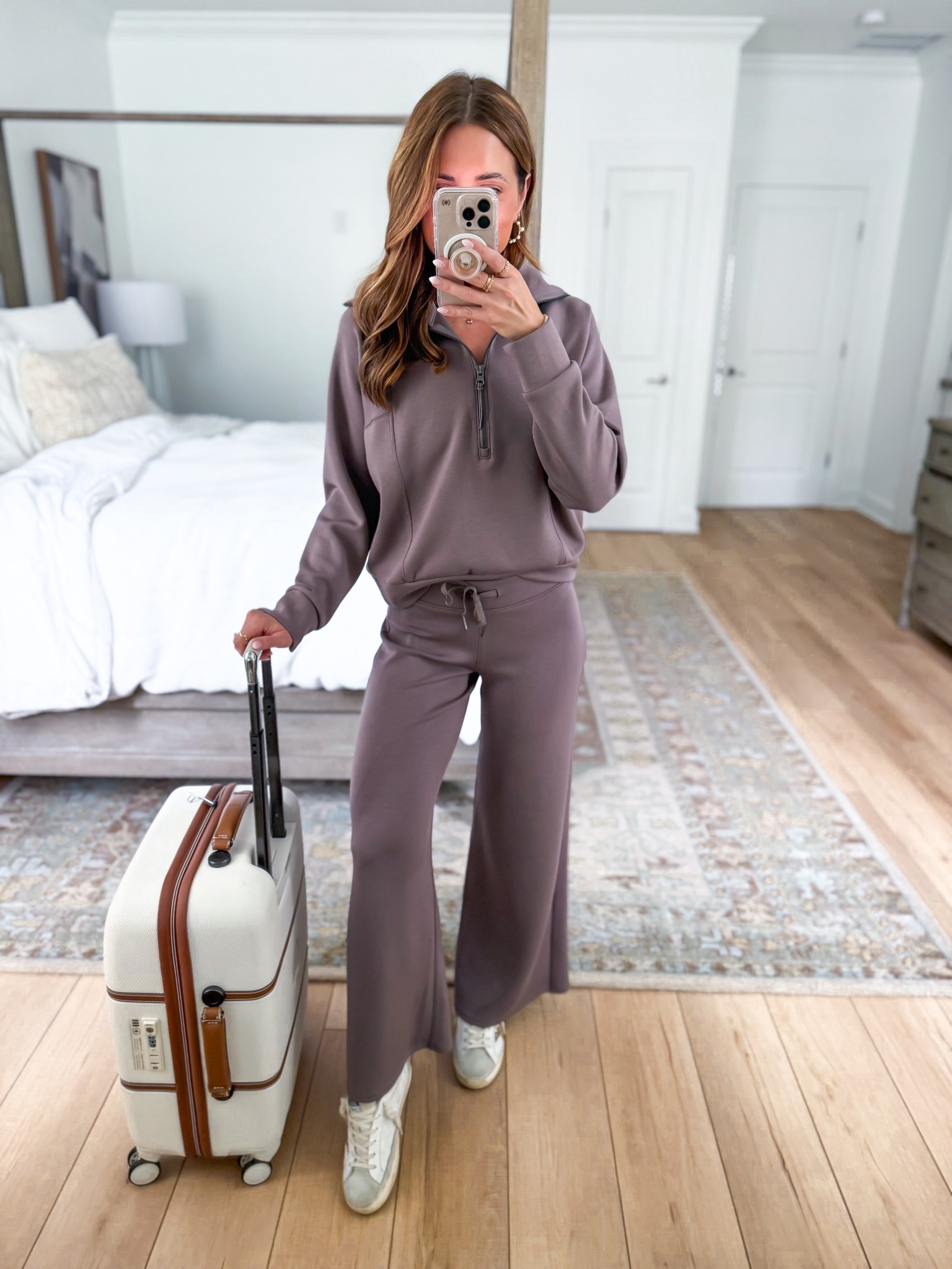 Travel outfit - what I’m wearing to the airport! Airport outfit. Matching set. Matching pant set. Casual outfit. Spanx air essentials wide leg pants in XS petite. Spanx Air essentials half zip in XS, smoke. This is AMAZING and insanely soft/comfortable! 

#LTKTravel #LTKPetite #LTKShoeCrush