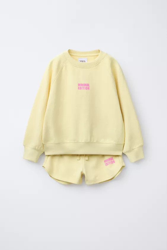 Two-piece set. Round neck, long sleeve sweatshirt. Ribbed trims. Bermuda shorts with elasticated ... | Zara UK