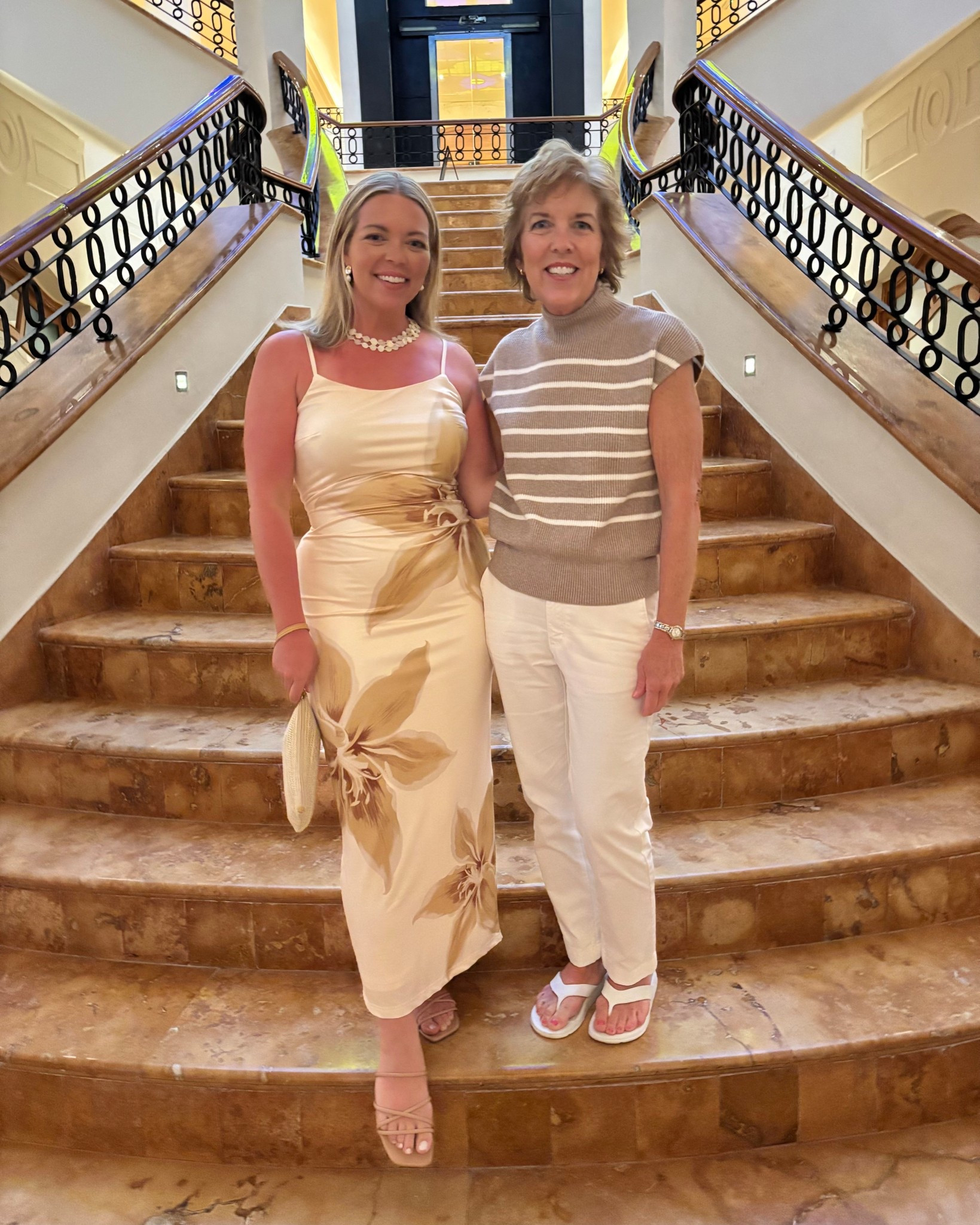 This Amazon dress is everything! I love it - so comfy and comes in several colors.
This little wristlet is what I always bring on beach/resort trips. Only $10, good quality, and works perfectly! 
And these sandals are my favorite for flat heel, 10/10 recommend. 
All from Amazon 🙂