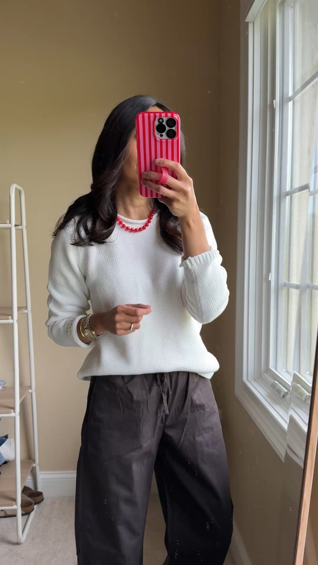 Modern classic spring outfit for a chilly day. 
- Cotton roll neck sweater. Can work year round. 
(Size up in exact sweater)
- Cotton poplin pants. Effortless pull on style for when you want a change from jeans. 
(I sized down in exact pants)
- Pop of color necklace 
- Textured slide sandals and nail polish from @Birkenstock US 
- Everyday crossbody bag that works well as a travel bag too
- Gold bracelets that elevate basic outfits
- Lip blush from @Merit for a comfy natural wash of color. My shade: vendome.

#LTKOver40 #LTKootd