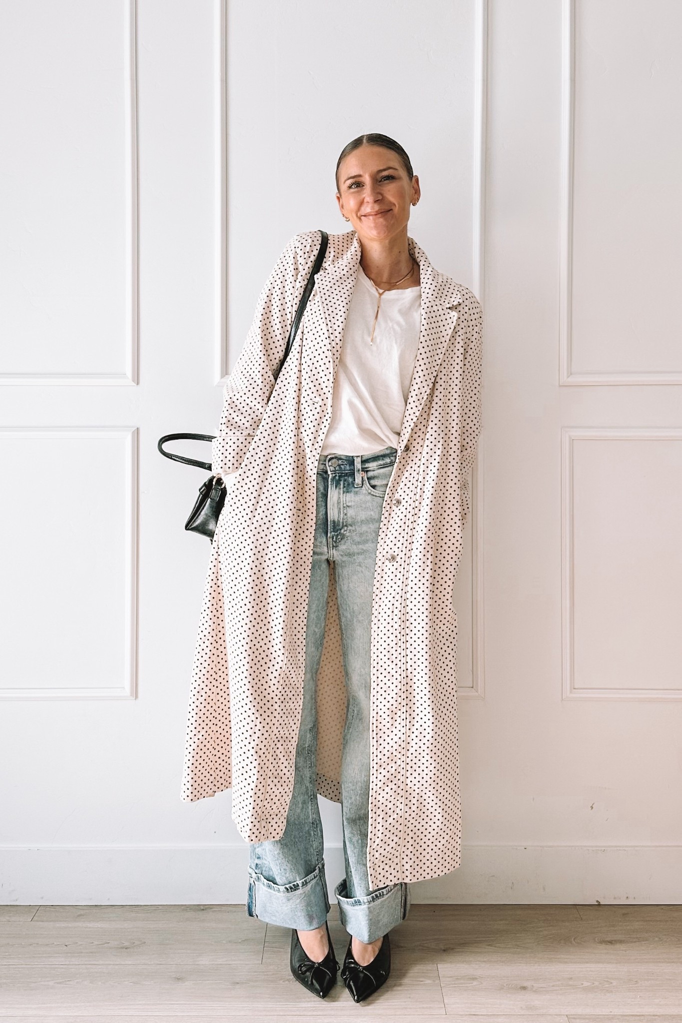 Easy everyday outfit with a neutral polka dot trench layered over a classic white tee and relaxed straight leg jeans.
This is one of those outfits that feels polished but still effortless — perfect for errands, lunch dates, or casual workdays.
I love how the structured trench elevates simple basics without trying too hard.

#LTKgrwm #LTKootd #LTKmomlife