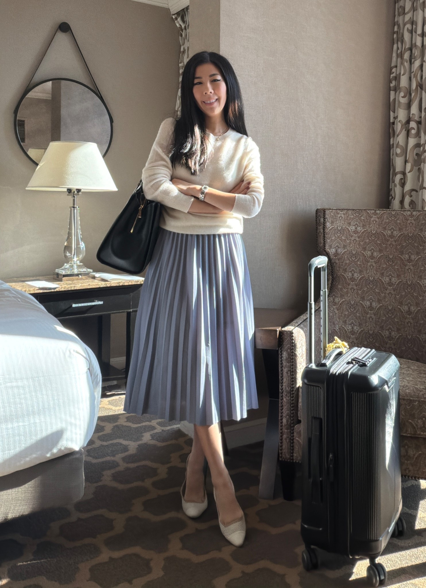 An outfit that’s work appropriate yet comfortable enough for travel. I paired this ivory cashmere sweater with my periwinkle pleated midi skirt. For accessories, I wore my black laptop tote bag and block slingback heels.

#pleatedskirt #midiskirt #cashmeresweater #katespade #worktote #slingbacks

#LTKTravel #LTKWorkwear #LTKPetite