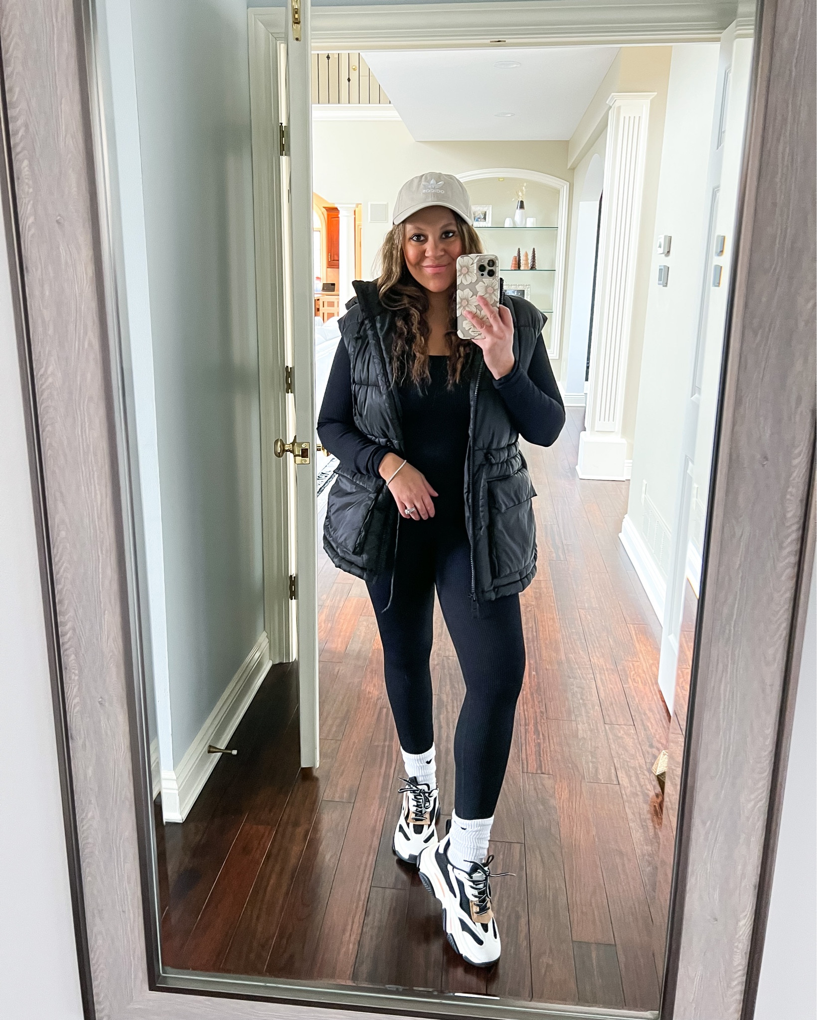 Spring transition outfit. Spring outfit. Viral Amazon jumpsuit. Workout jumpsuit. Puffer vest. Chunky sneakers. Spring look. Casual outfit. Weekend style.

#LTKunder100 #LTKFind #LTKSeasonal
