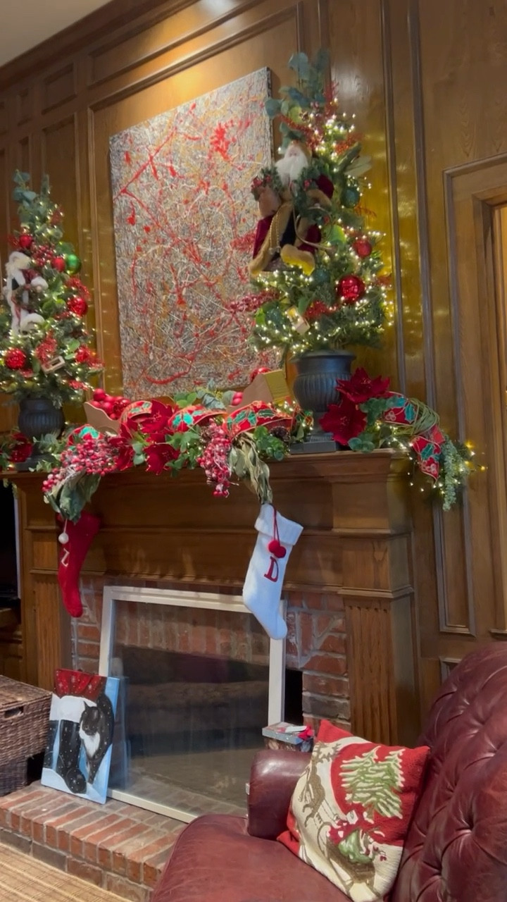 Santa’s Workshop Mantel 👇

This was the mantel that went with the Santa’s Workshop tree.  It’s another example of a mantel with two pedestal trees on either end, garland in the middle and designer ribbon throughout.  

Before I popped my Santa’s into the pedestal trees, I lit those tree with 20 foot cluster lights.  I added one strand of the 73.8 foot snake lights in the original warm white color throughout the garland.  #LTKHoliday #LTKhome

#LTKSeasonal