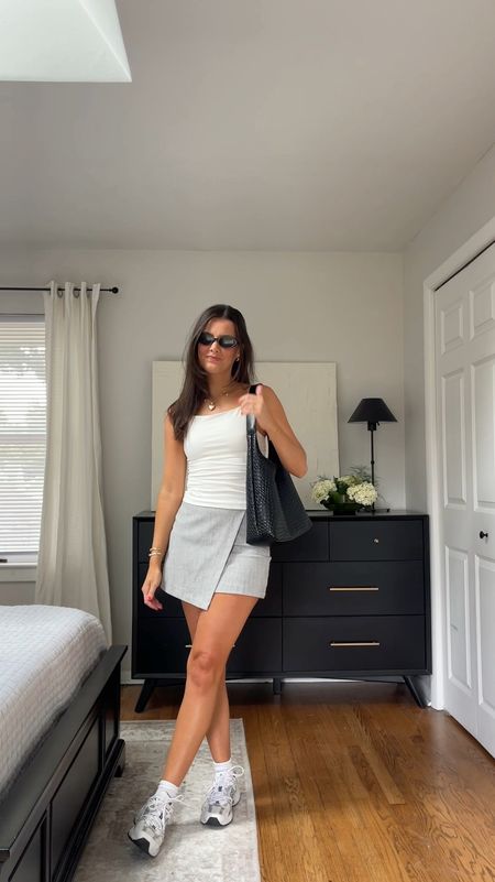 Sneakers and a mini skort is probably my favorite outfit combo 🥰 wearing XS in the skirt and S in the top! 

#LTKFindsUnder100 #LTKSeasonal #LTKVideo