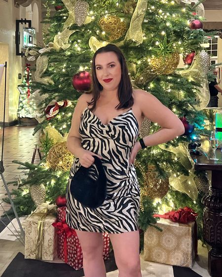 Zebra print slip dress for the holidays! So fun and different than the usual holiday outfits or cocktail dresses  

#LTKGiftGuide #LTKSeasonal #LTKHoliday