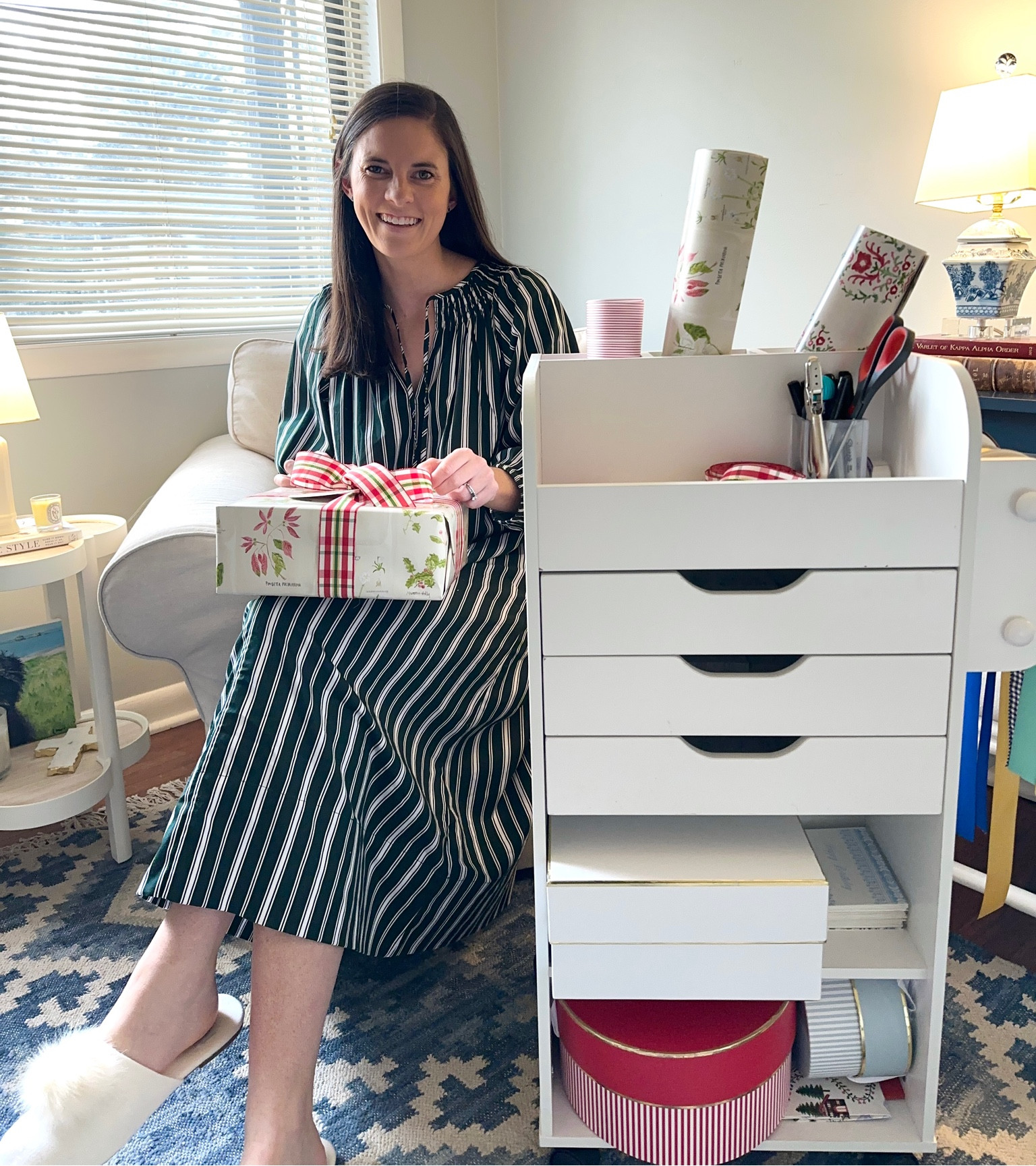 We’re celebrating Christmas with Hunter’s family early, so my wrapping cart has been getting plenty of use this week! I knew Hunter wasn’t going anywhere when he insisted I bring it from my house to his last year for him to assemble…even if he may have thought the idea of it was a bit much. When I’m not wheeling it to our dining room we store it in a closet and I love how organized it has kept all of my present wrapping supplies. The back has room for wrapping paper, there are spindles on the sides for ribbon, and the drawers are perfect for gift tags! If you’ve been feeling like there’s no way to get these supplies organized I think this will change your mind. I’ve linked it and the supplies I’ve used this year on my LTK Profile (Prepinyourstep). 

Wrapping paper, wrapping paper organization, Christmas organizer, wrapping cart, gift tags, Christmas presents, storage cart 

#LTKhome #LTKfindsunder100 #LTKHoliday