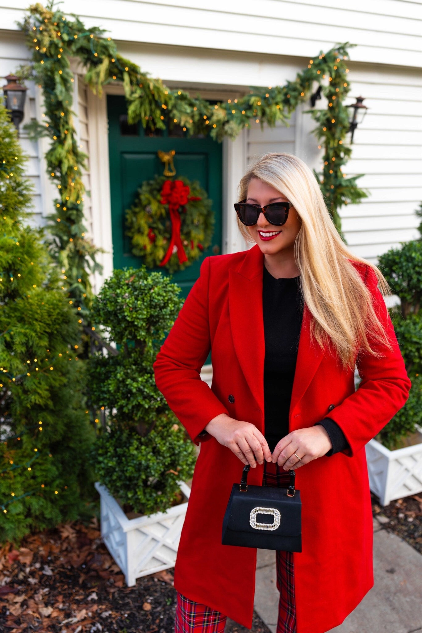 A great red wool jacket, red tartan pants, black wool sweater, and black bamboo handle evening bag

#LTKOver40 #LTKootd #LTKHoliday